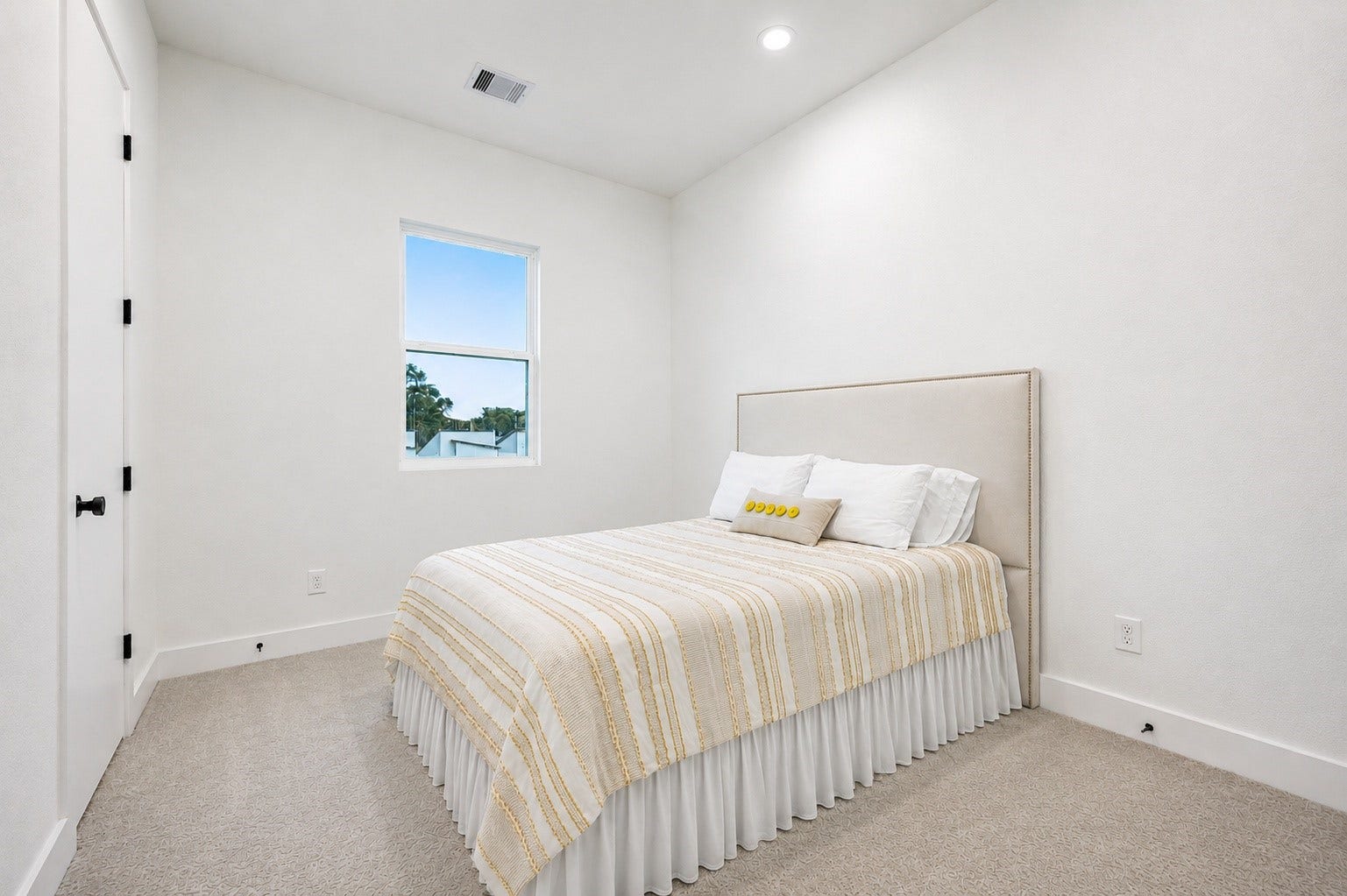 Also located on the third floor, the secondary bedroom offers the comfort and privacy of an ensuite bath and a generous walk-in closet.