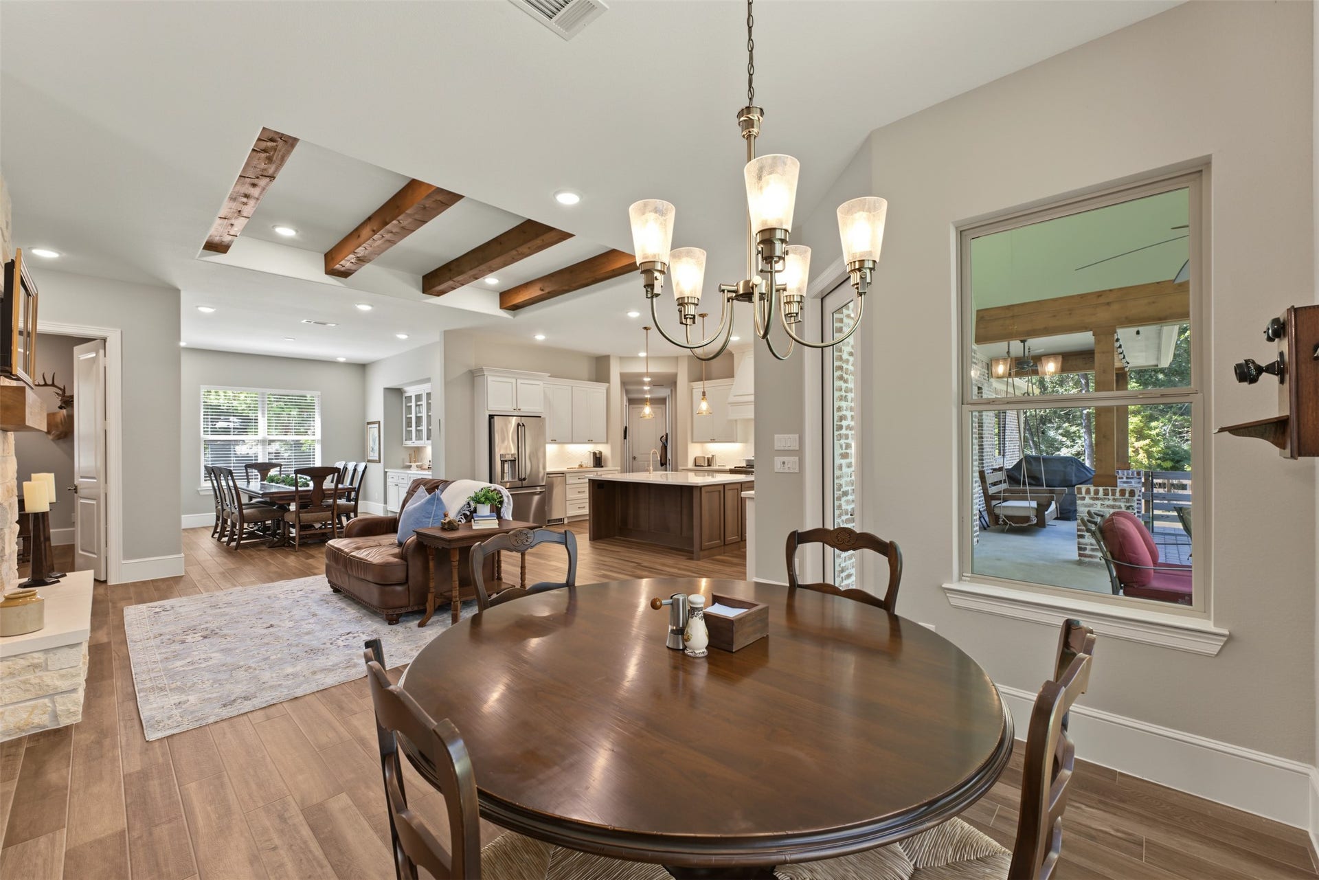 501 Corsair Court, Montgomery, TX 77316 The breakfast area overlooks the backyard where the deer peer in to see what is for breakfast.