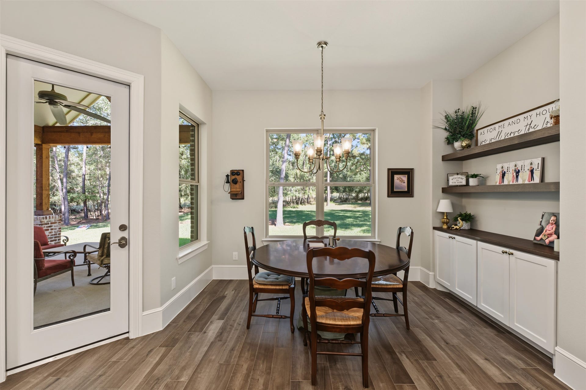 501 Corsair Court, Montgomery, TX 77316 The breakfast area overlooks the backyard where the deer peer in to see what is for breakfast.