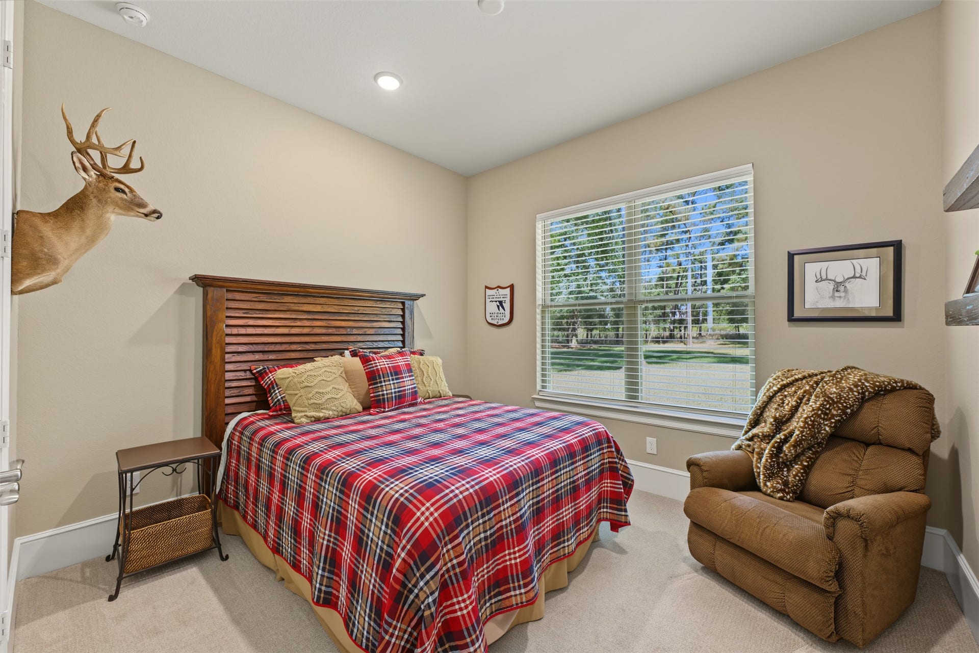 501 Corsair Court, Montgomery, TX 77316 Secondary bedroom with a view of the back yard.