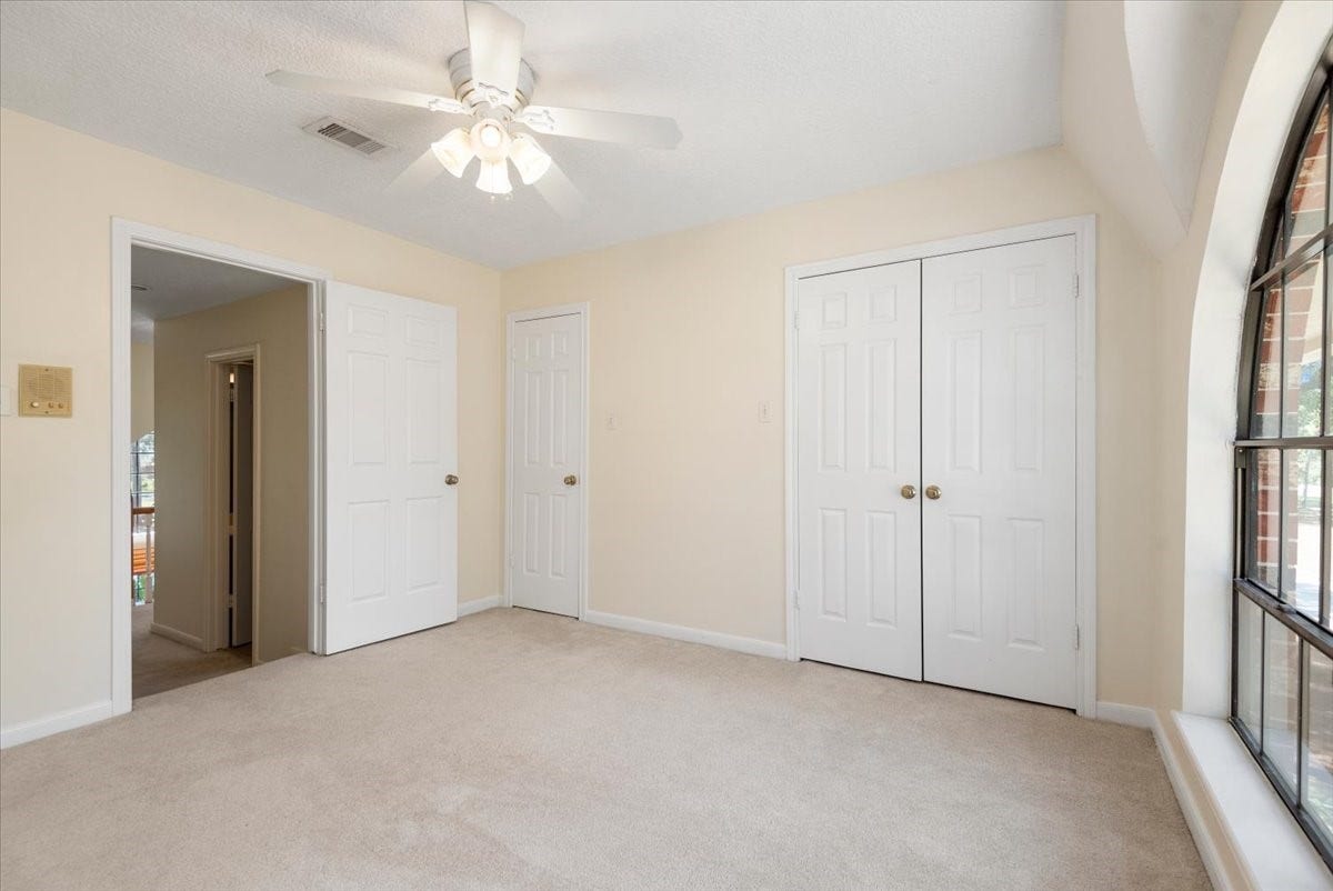 7514 Pinehurst Shadows Drive, Humble, TX 77346 View 2 of bedroom #3. This room has a huge closet.