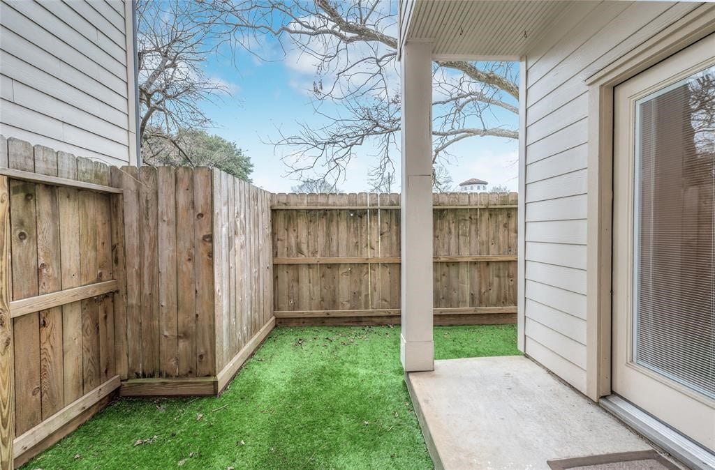 Patio for relaxing summer evenings with low maintenance turf