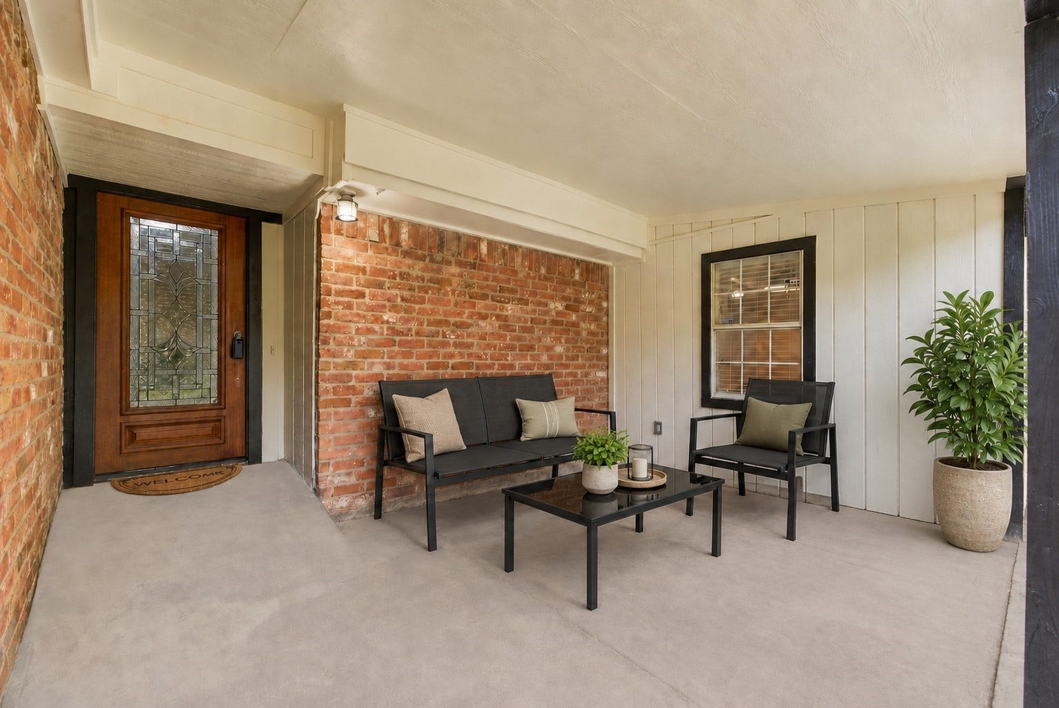 Spacious front patio area. Photo enhanced with AI for illustrative purposes.