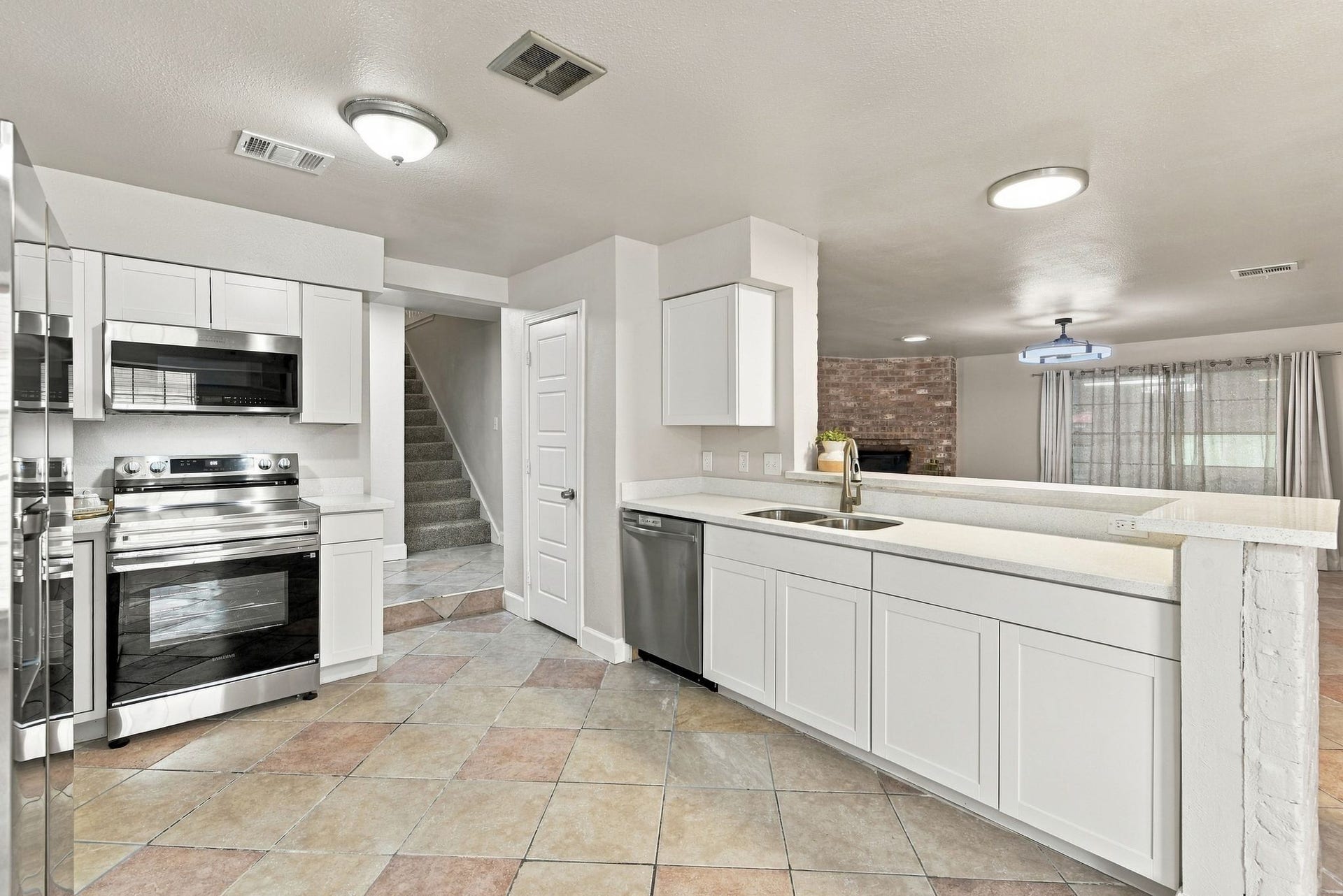 All new cabinets and stainless-steel appliances.