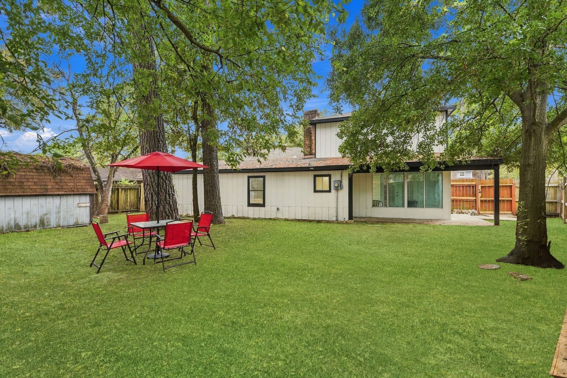 Spacious shaded backyard