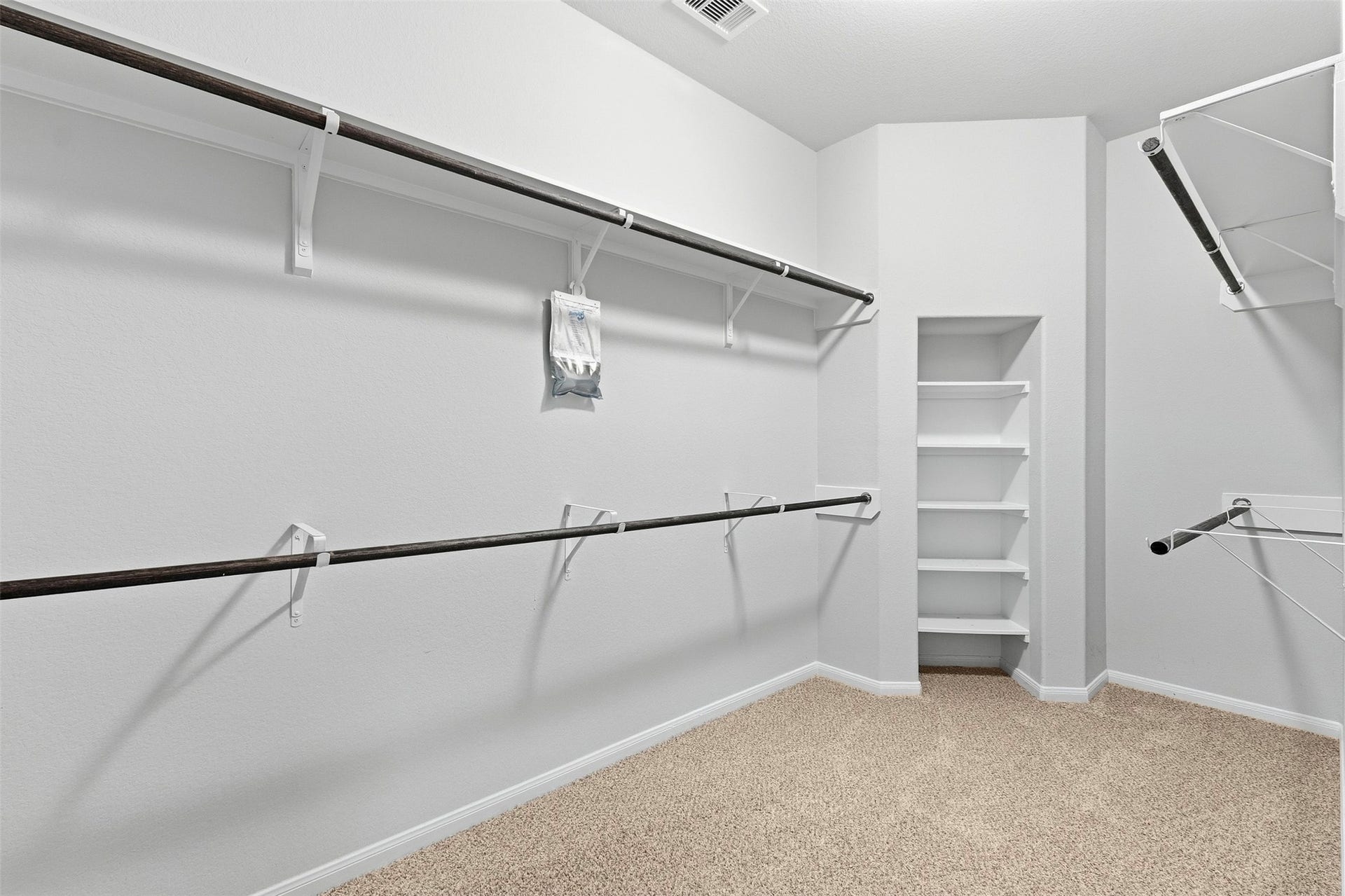 There is plenty of room for all of your belongings in this closet.
