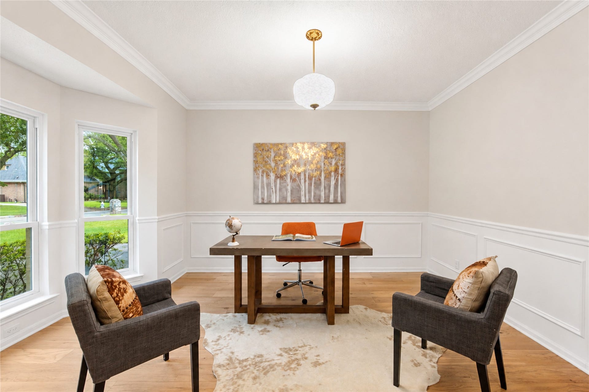 Flexible, light-filled space featuring French Oak floors and elegant millwork, ideal for a home office, formal dining room or additional living area to suit your lifestyle.