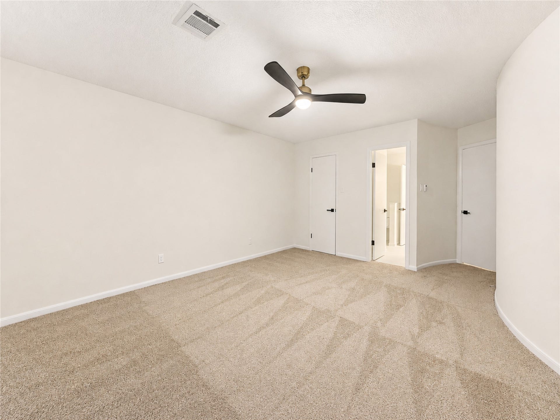 Third upstairs bedroom offers a comfortable, versatile retreat with fresh paint, new carpet and an updated ceiling fan. Generous proportions provide plenty of space to create a relaxing bedroom, study area or personalized retreat for family or overnight guests.