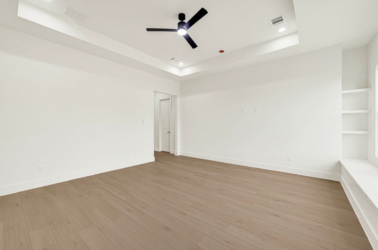 4806 Farmer St, Houston, TX 77020 Primary bedroom featuring high ceilings, plenty of natural light and generously sized.
