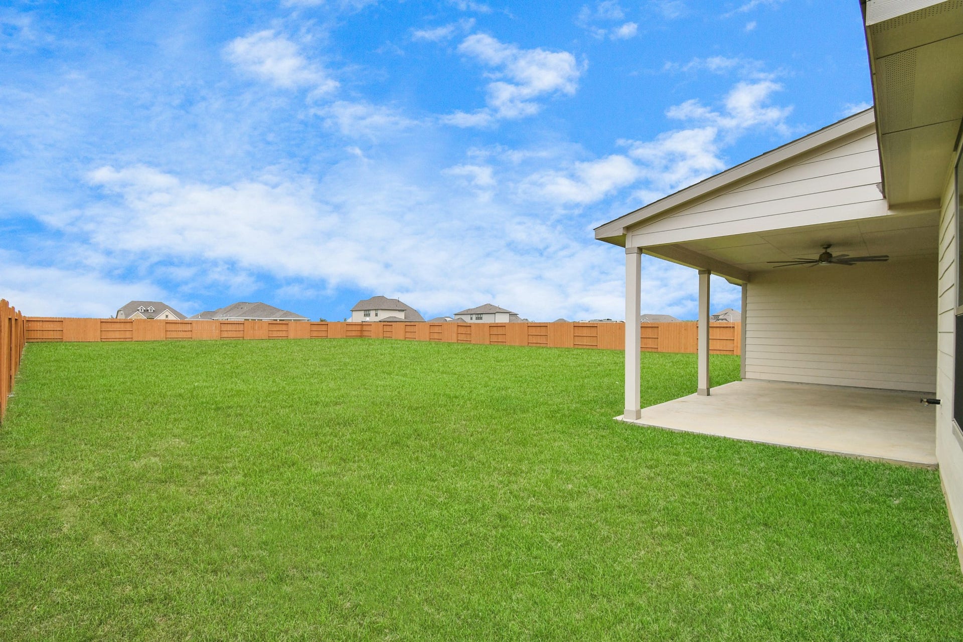 395 Hunter Ranch Way, Dayton, TX 77535 Generous backyard offers plenty of room to create your ideal outdoor living space