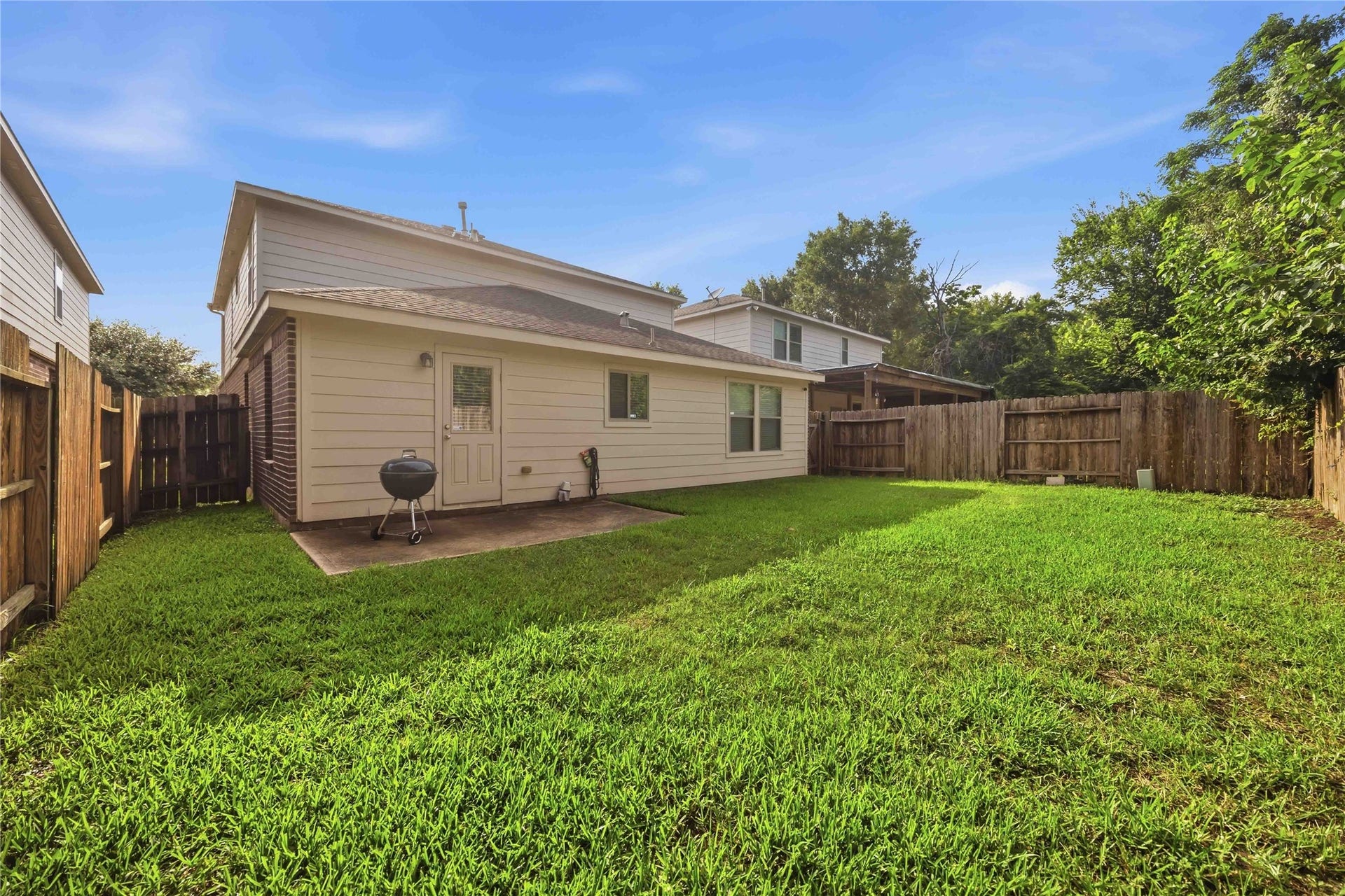 15426 Hope Shadow Court, Cypress, TX 77429 Beautiful trees behind home make for peaceful and scenic evenings.