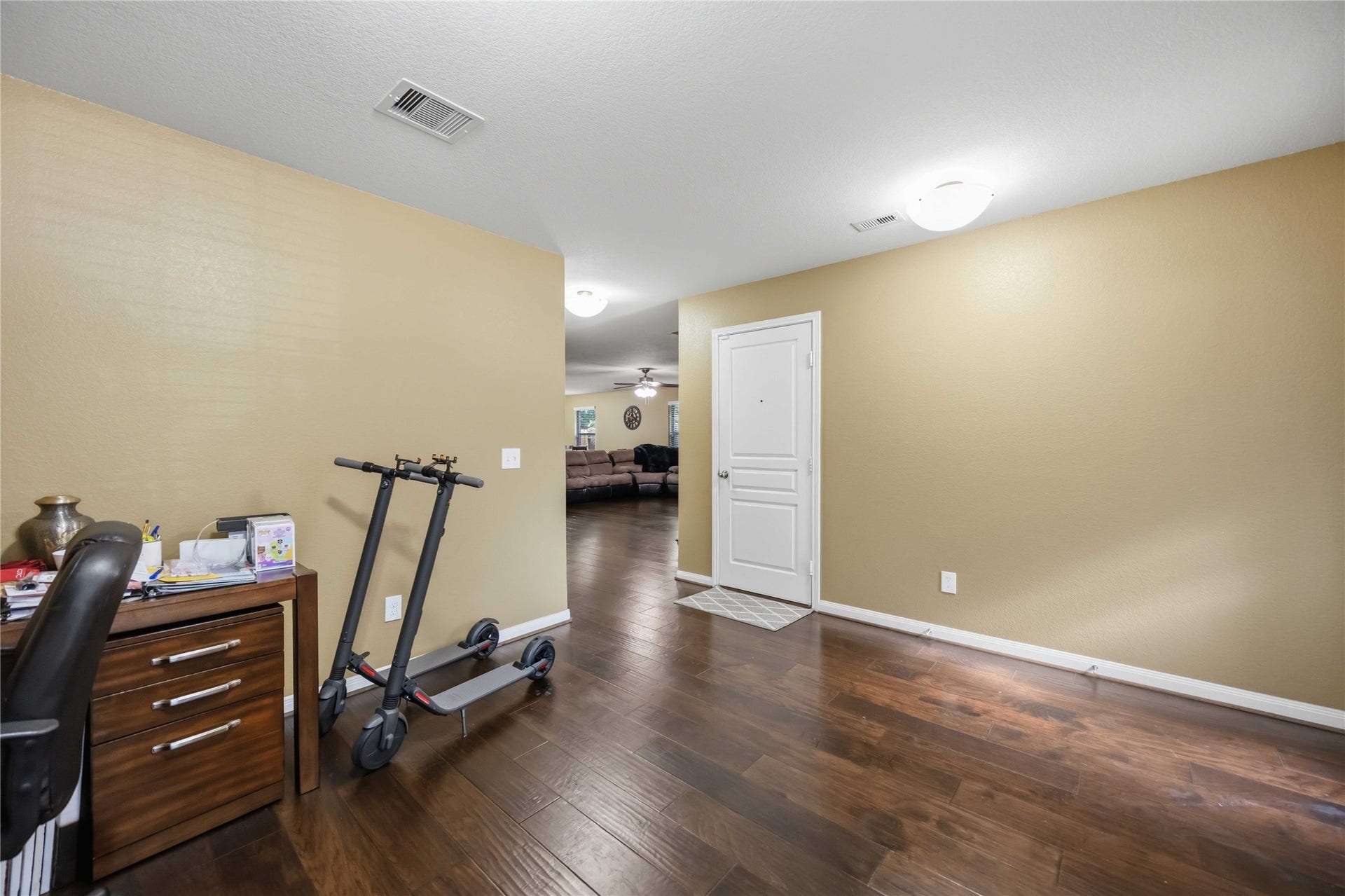 15426 Hope Shadow Court, Cypress, TX 77429 Formal & flexible living space upfront w/ beautiful wood flooring.