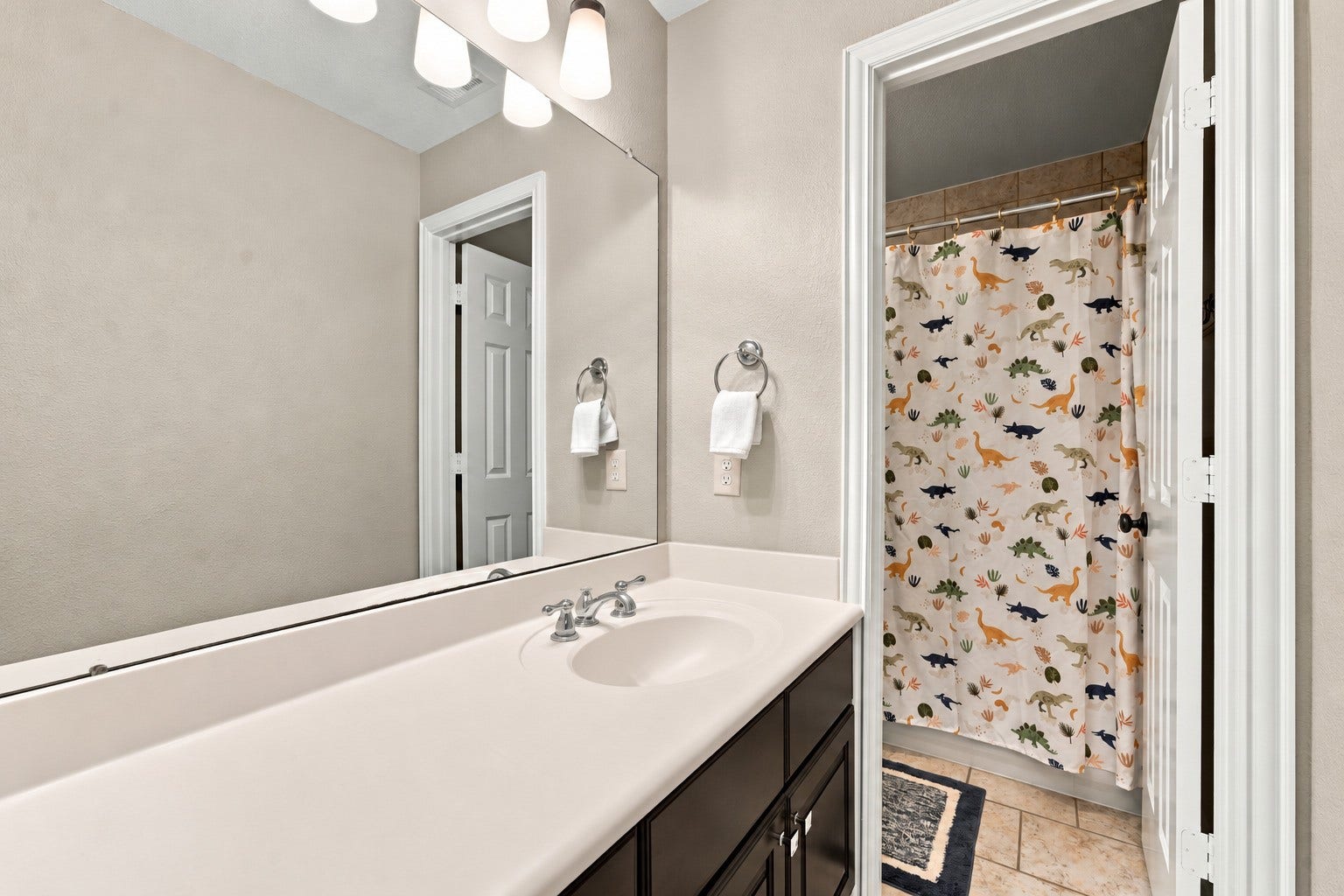 14423 Tivoli Drive, Houston, TX 77077 This bathroom connects to a secondary bedroom while also offering convenient access from the second-floor landing.