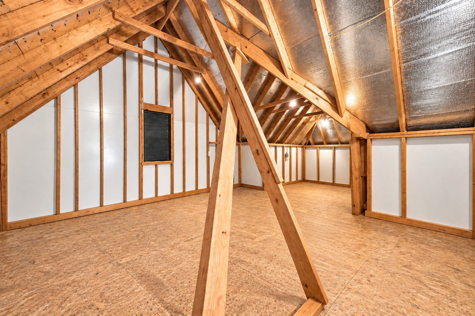 14423 Tivoli Drive, Houston, TX 77077 The walk-in attic offers floored storage space with lighting for convenient access and organization. This space can be built out as an extra living area in the future (if needed).