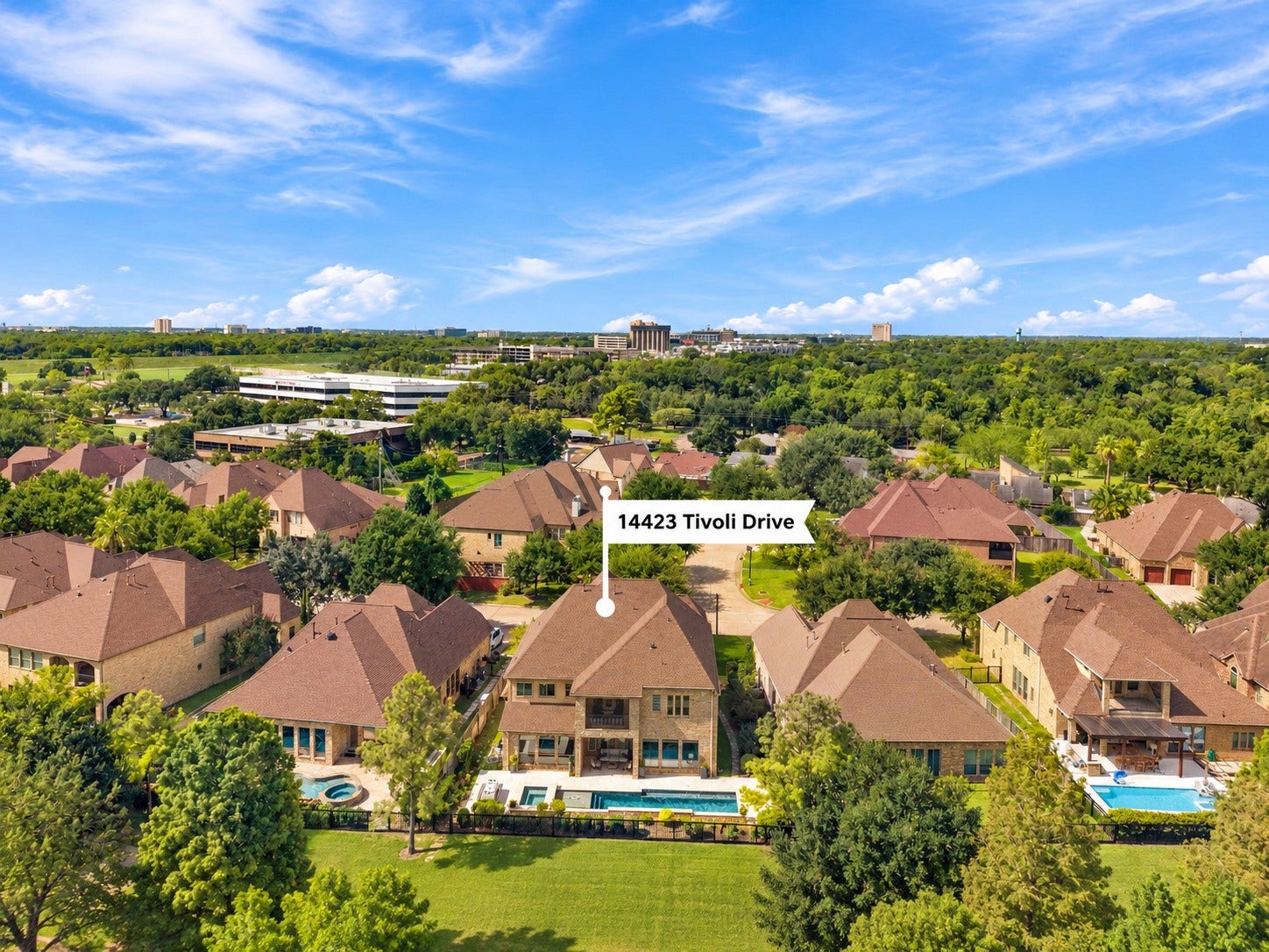 14423 Tivoli Drive, Houston, TX 77077 An impressive aerial perspective highlights the home, private pool and beautiful surroundings, giving you a true sense of the lifestyle this property offers.