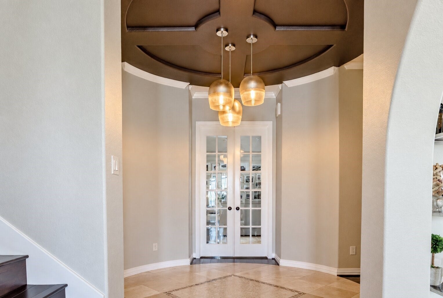 14423 Tivoli Drive, Houston, TX 77077 The entry foyer makes a distinctive first impression with an architectural ceiling treatment and clustered pendant lighting