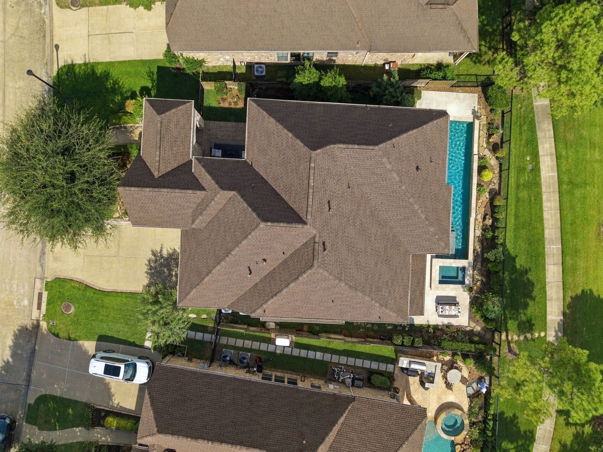 14423 Tivoli Drive, Houston, TX 77077 Aerial view reveals the exceptional use of space, featuring an expansive residence, private pool and outdoor retreat.