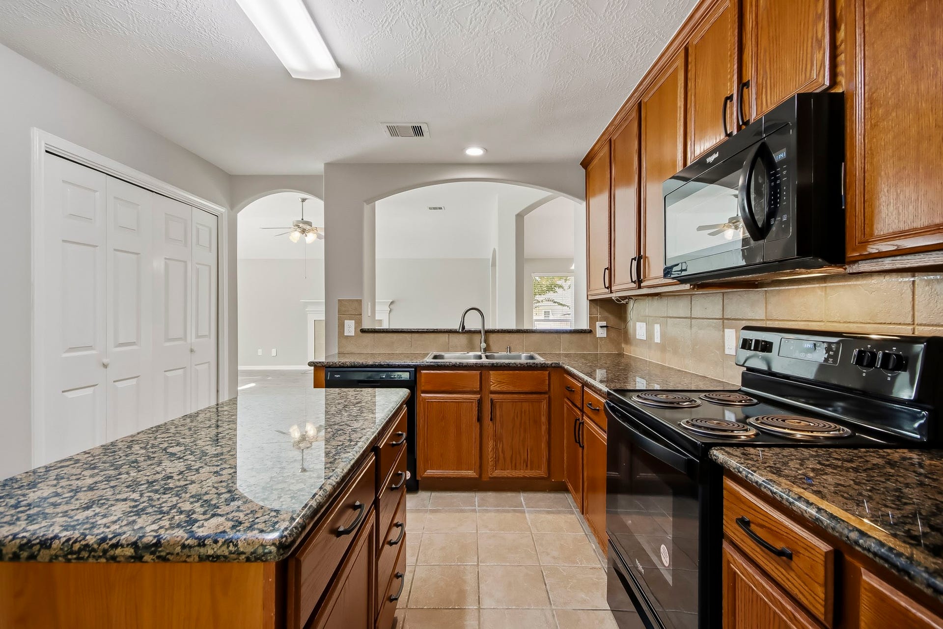 12222 Hawthorne Drive, Montgomery, TX 77356 Another view of the large island & kitchen