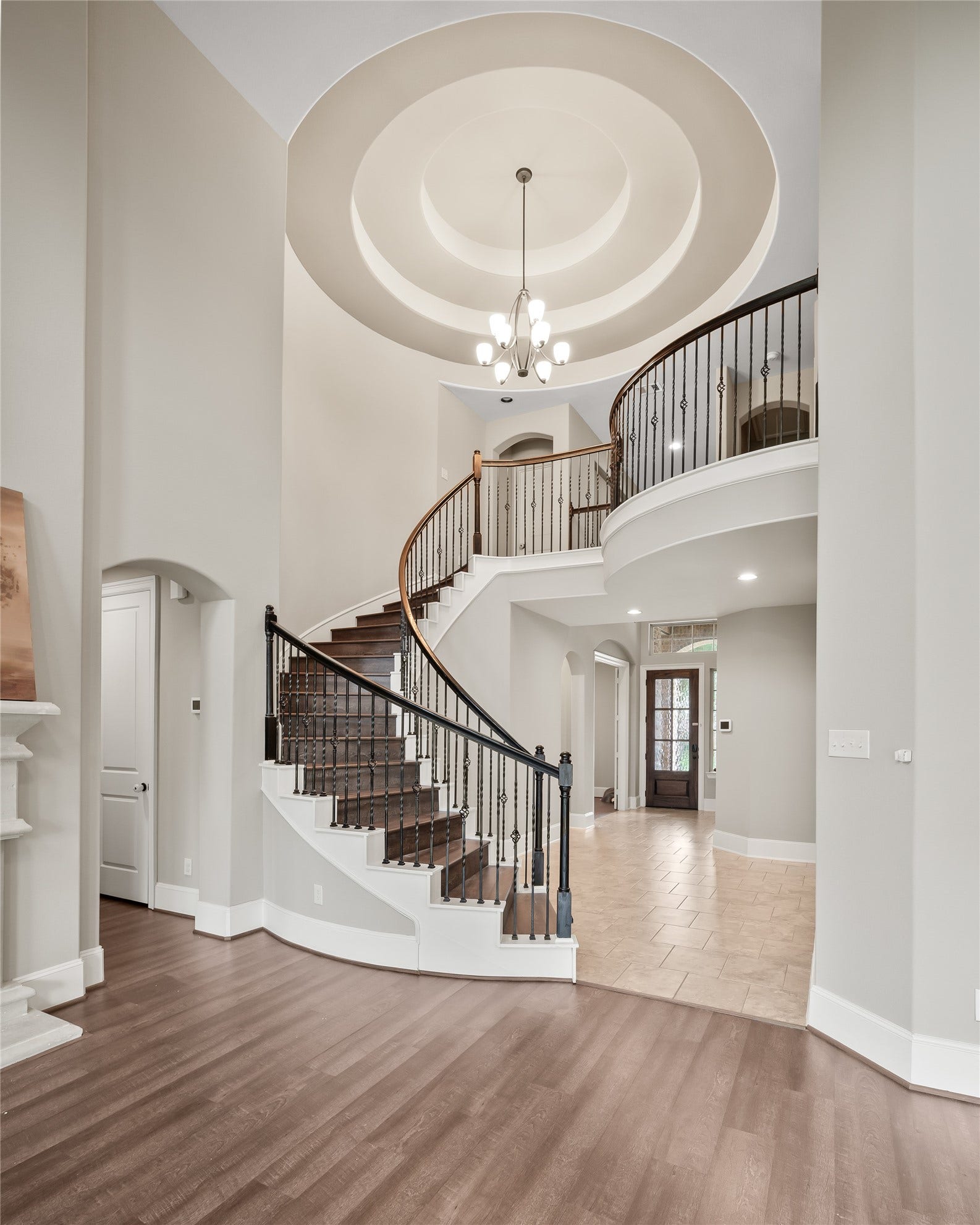 1714 Wickham Reach Drive, Spring, TX 77386 The vestibule to the left of the stairs is the entrance to the Powder Room and Laundry room