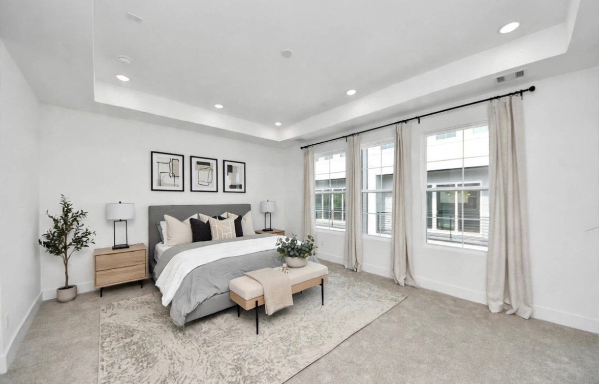 2428 Harrington Street, Houston, TX 77026 Virtually staged bedroom showcasing the spacious layout and modern design. Furniture and decor are digitally added for visualization purposes and may differ from the actual home.