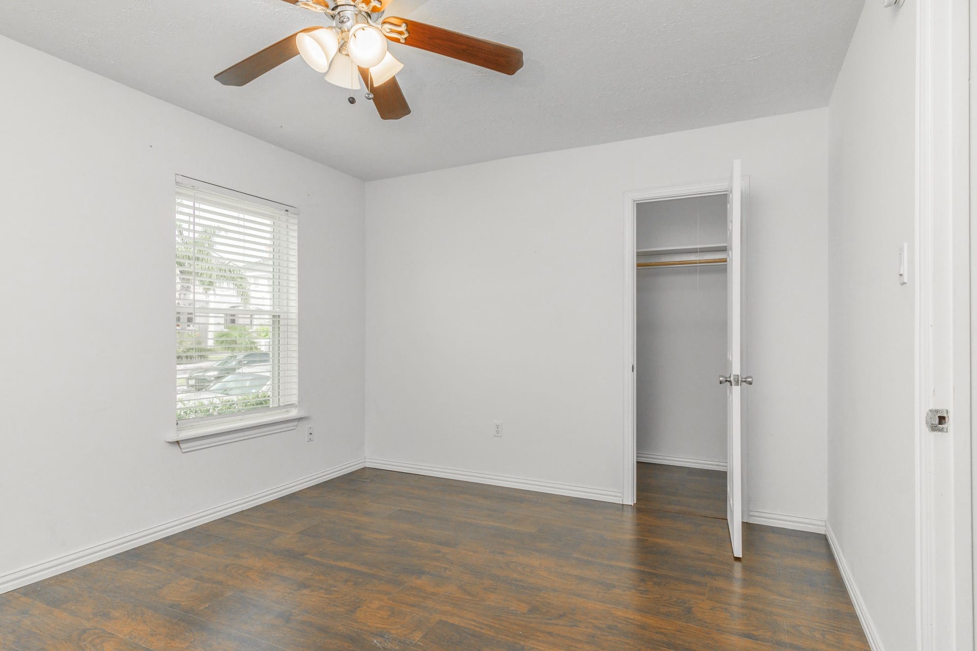 600 19th Street, #9, Galveston, TX 77550 Spacious bedroom. **Listing photos from unit 4, and bedroom flooring might be different.