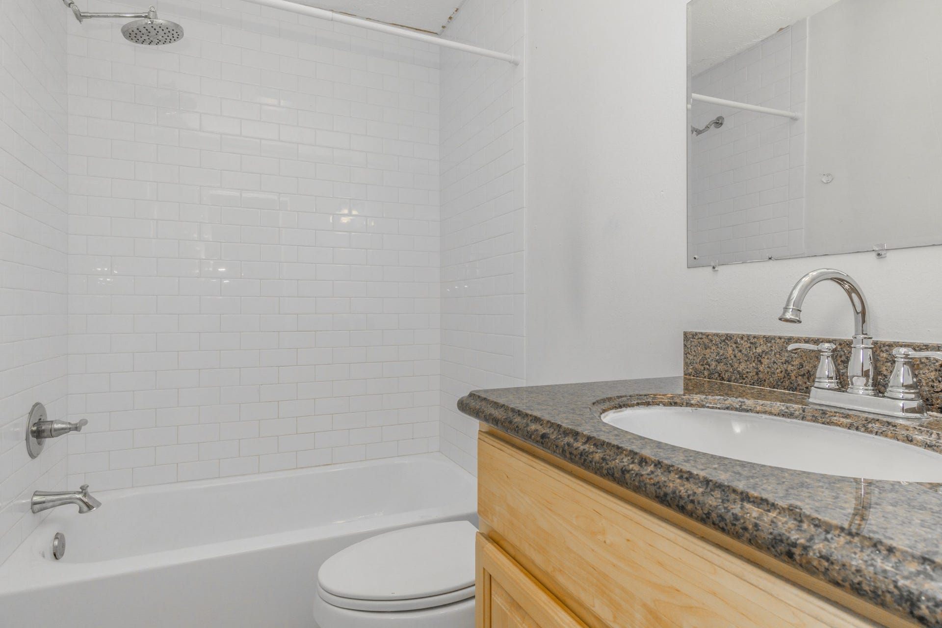 600 19th Street, #9, Galveston, TX 77550 Bathroom located down the hall with a sparkling granite vanity