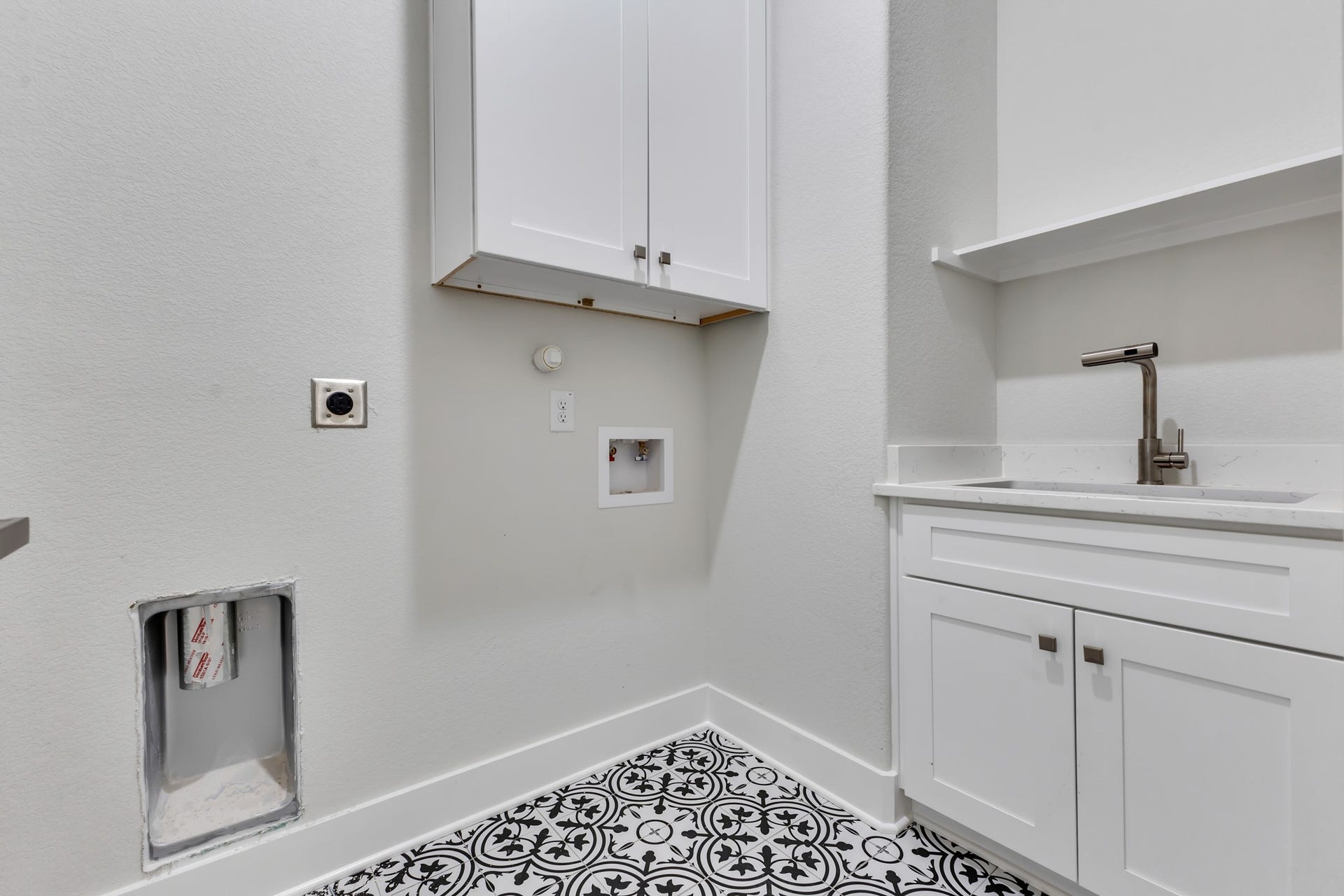 25903 Woodglen Drive, Spring, TX 77386 Laundry Room with Built-In Cabinets