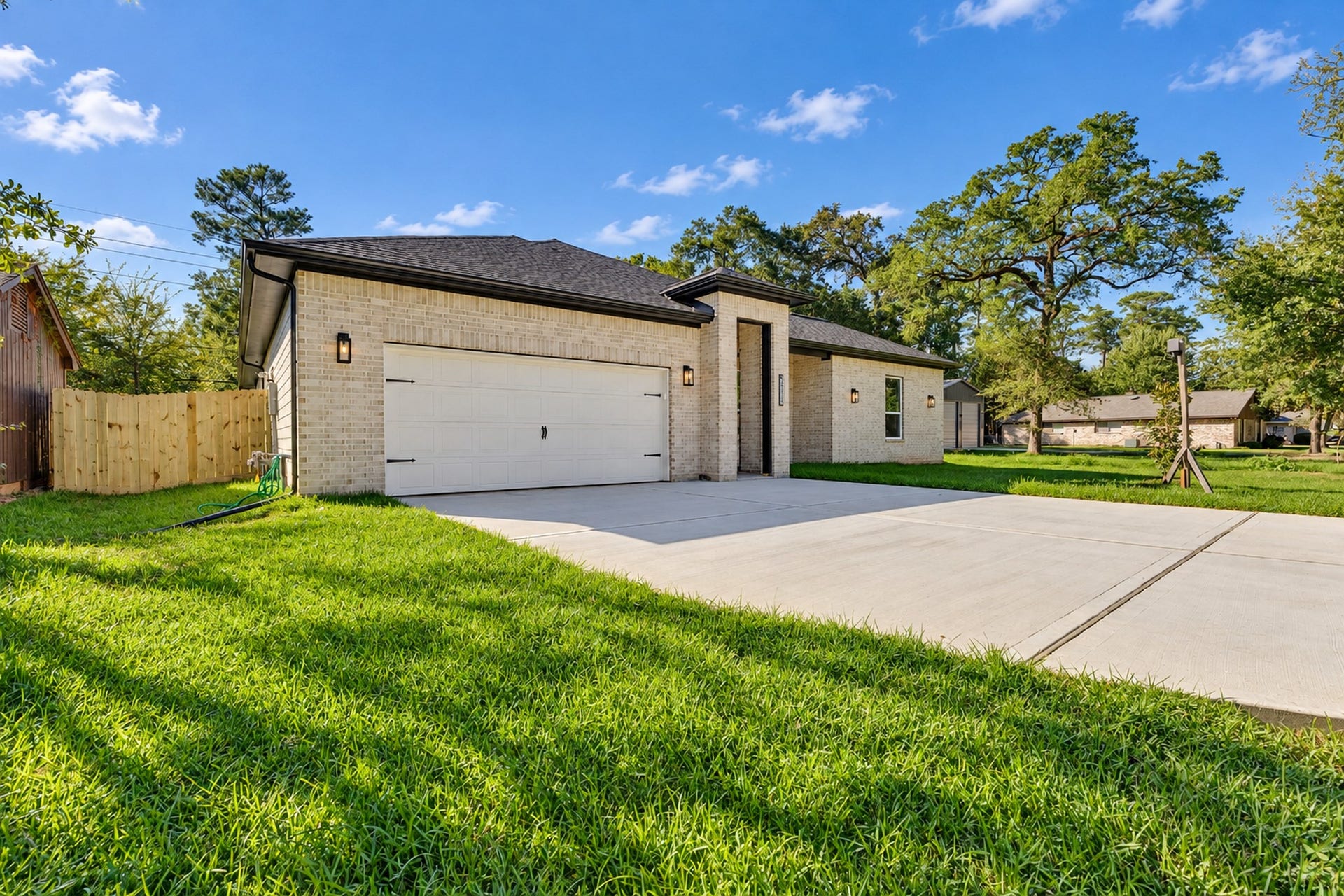 25903 Woodglen Drive, Spring, TX 77386 Attractive Exterior & Spacious Driveway