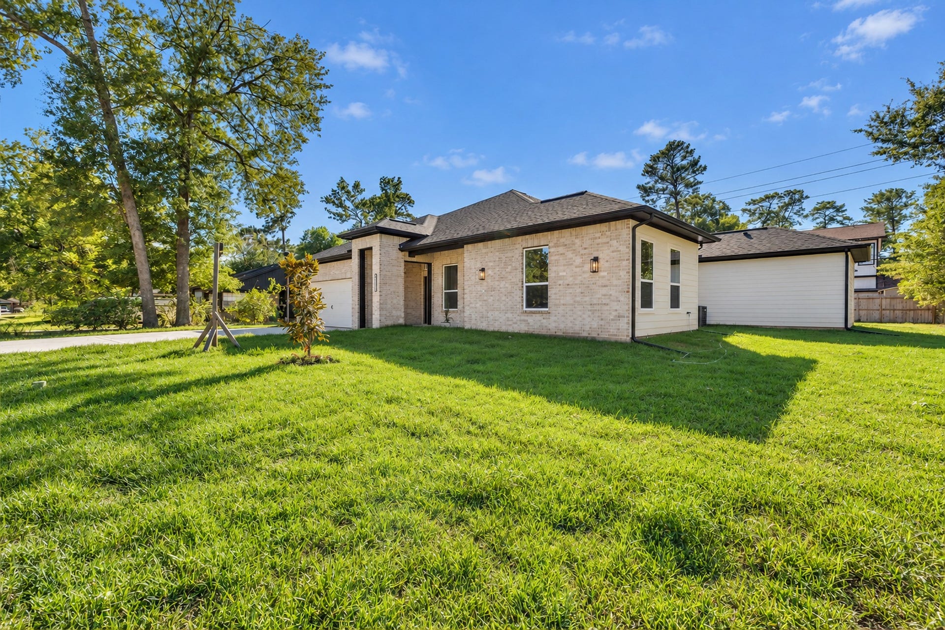 25903 Woodglen Drive, Spring, TX 77386 Beautiful Exterior & Green Lawn