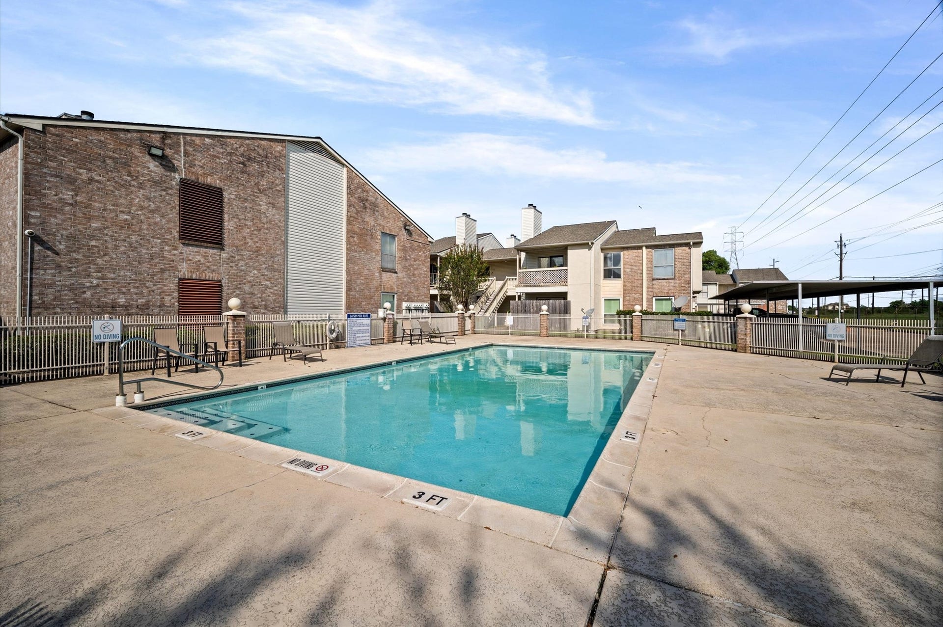 7600 Emmett F Lowry Expressway, #416, Texas City, TX 77591 Enjoy leisurely afternoons by the sparkling community pool, surrounded by a spacious sun deck and comfortable seating.