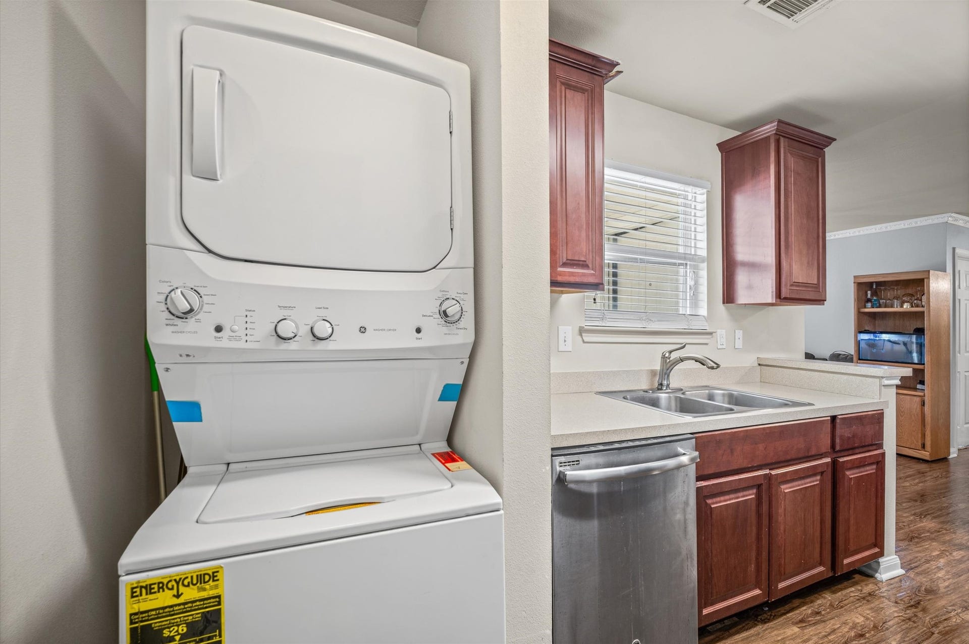 7600 Emmett F Lowry Expressway, #416, Texas City, TX 77591 Conveniently located in the kitchen area, a stackable washer and dryer set offers practicality.