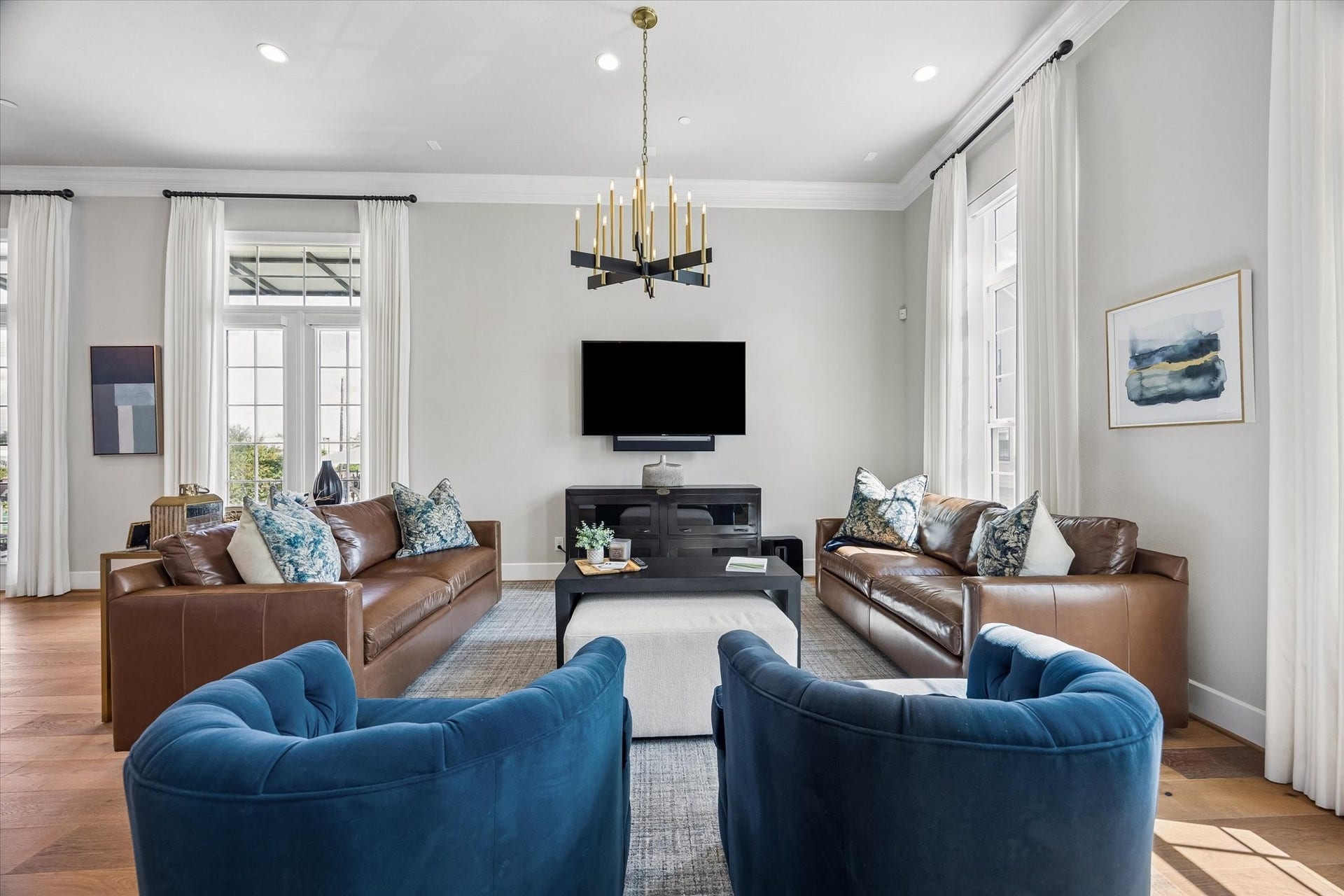 Bathed in natural light, this hard to find corner residence offers a sophisticated, modern living experience. The thoughtful design allows sunshine to pour into the interior, beautifully highlighting every high-end finish and architectural detail