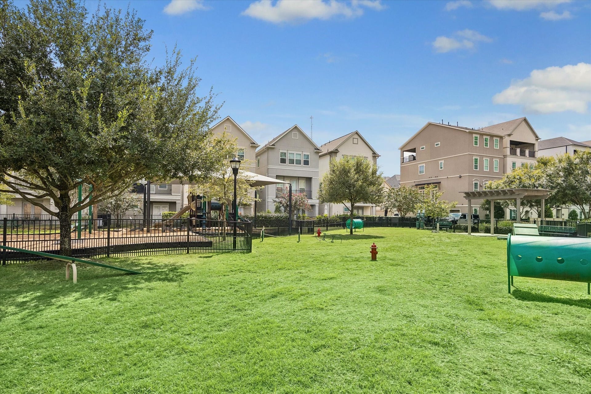 Enjoy the convenience of a fully fenced dog park located just steps away from your front door.