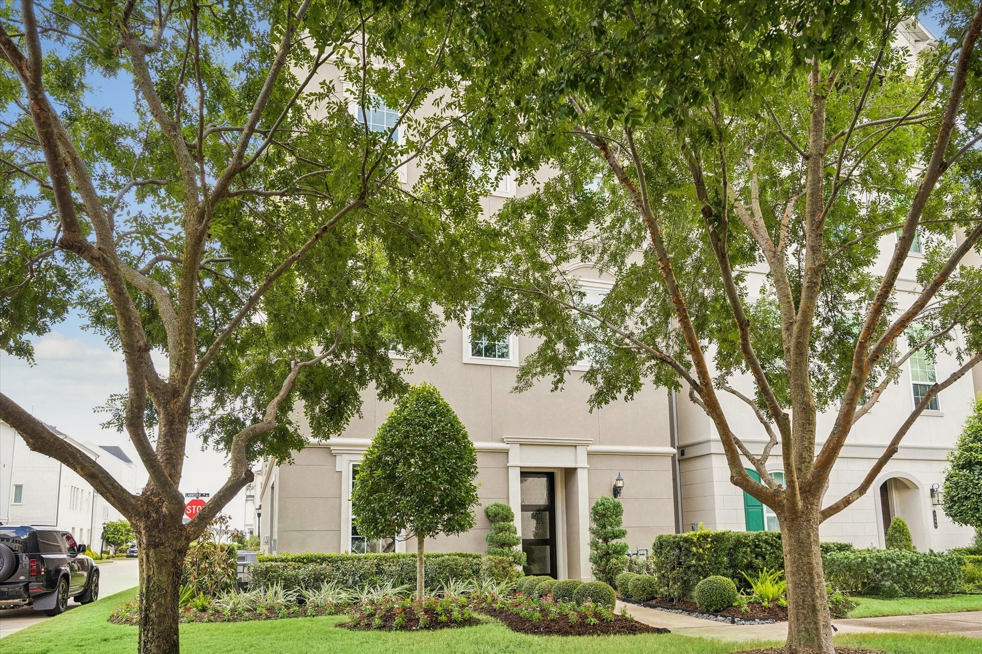 This beautiful home offers a rare blend of sophistication and absolute peace of mind, situated behind the privacy of a 24-hour guard-gated entry. The home is thoughtfully designed for effortless living, featuring a private elevator for easy access across floors and the added security of a full-home generator.