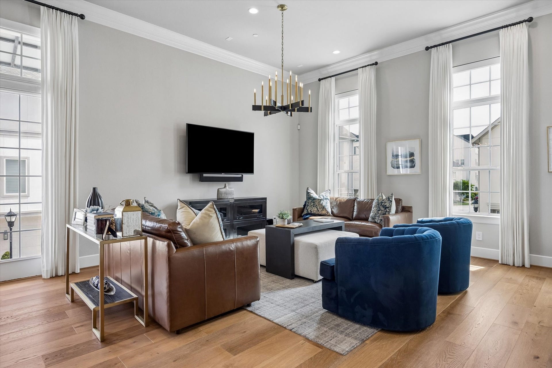 The living area is defined by exquisite crown molding, a thoughtful architectural detail that lends a sense of timeless sophistication and refined character to the space.