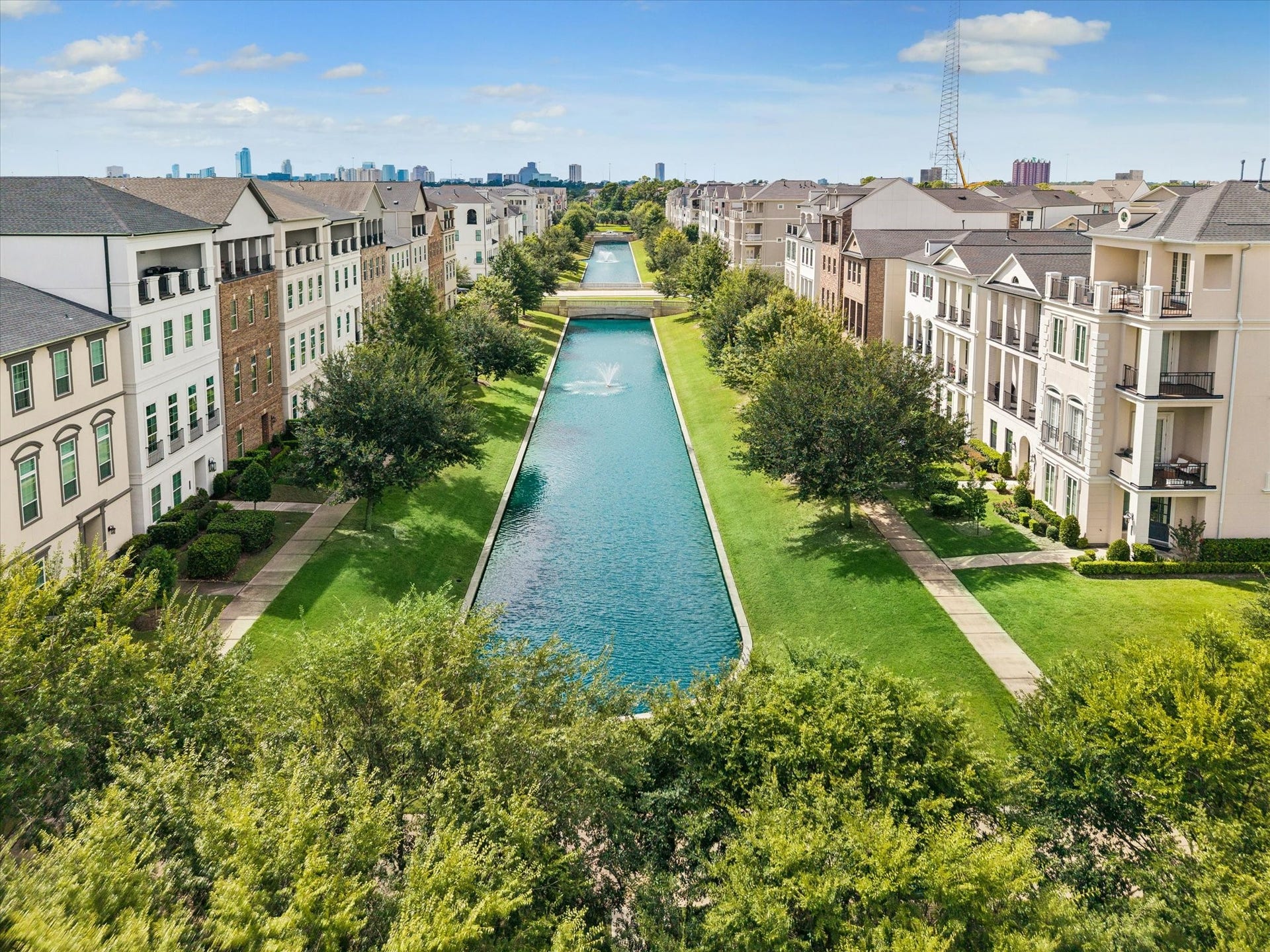 Set against a picturesque canal, this setting offers a refined lifestyle defined by lush green spaces and meticulously maintained grounds.