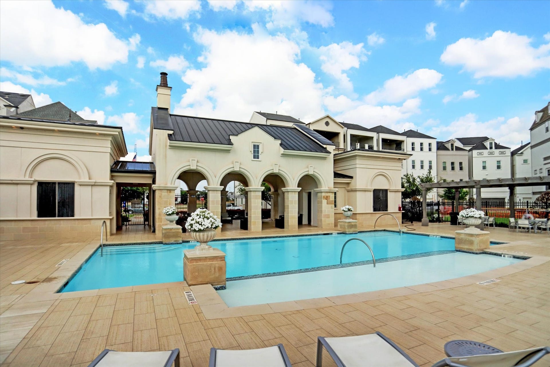 The community amenities are truly exceptional, highlighted by a stunning pool which overlooks the lake, and a sophisticated gathering area.