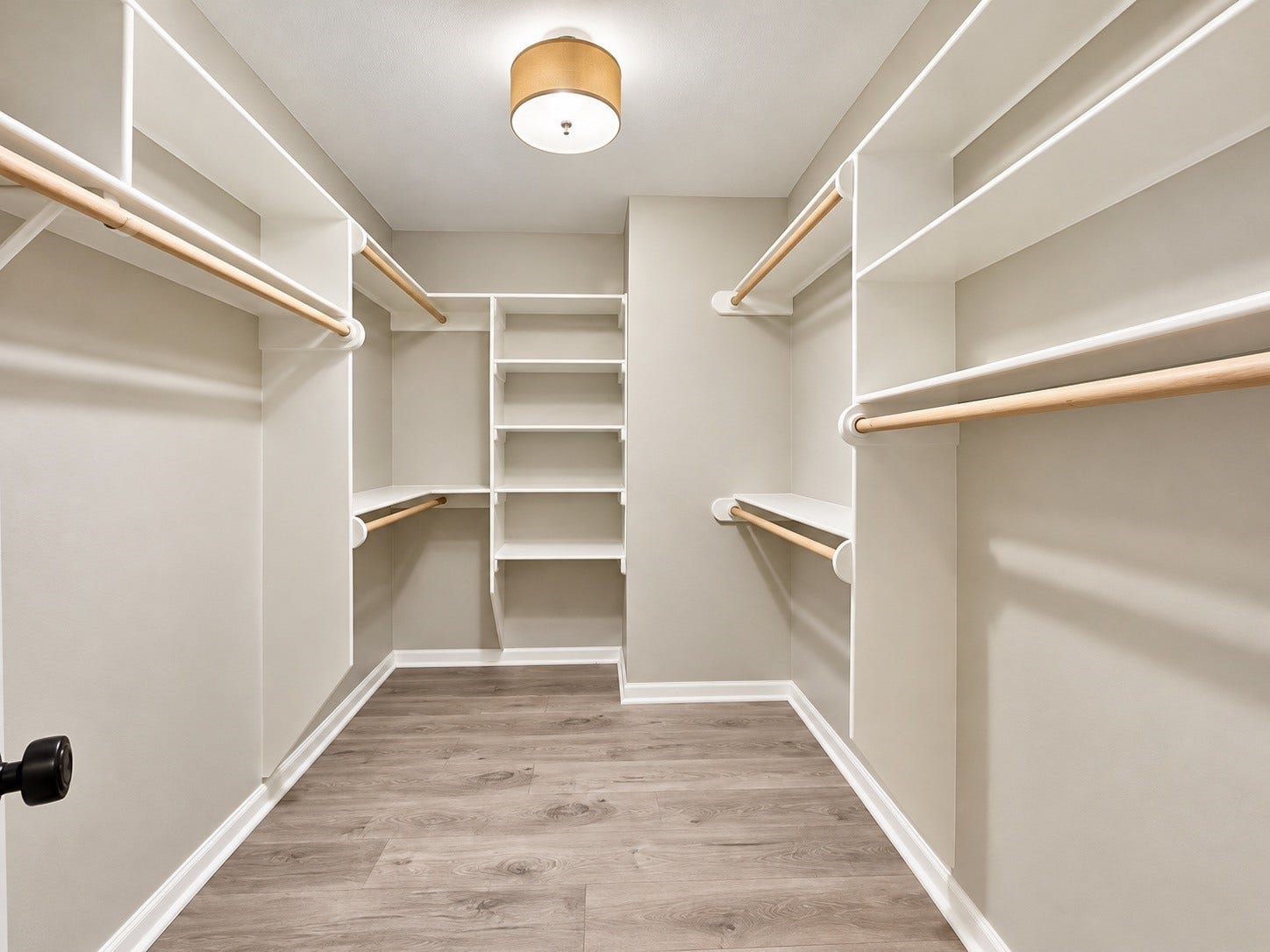A generous closet is ready for you.