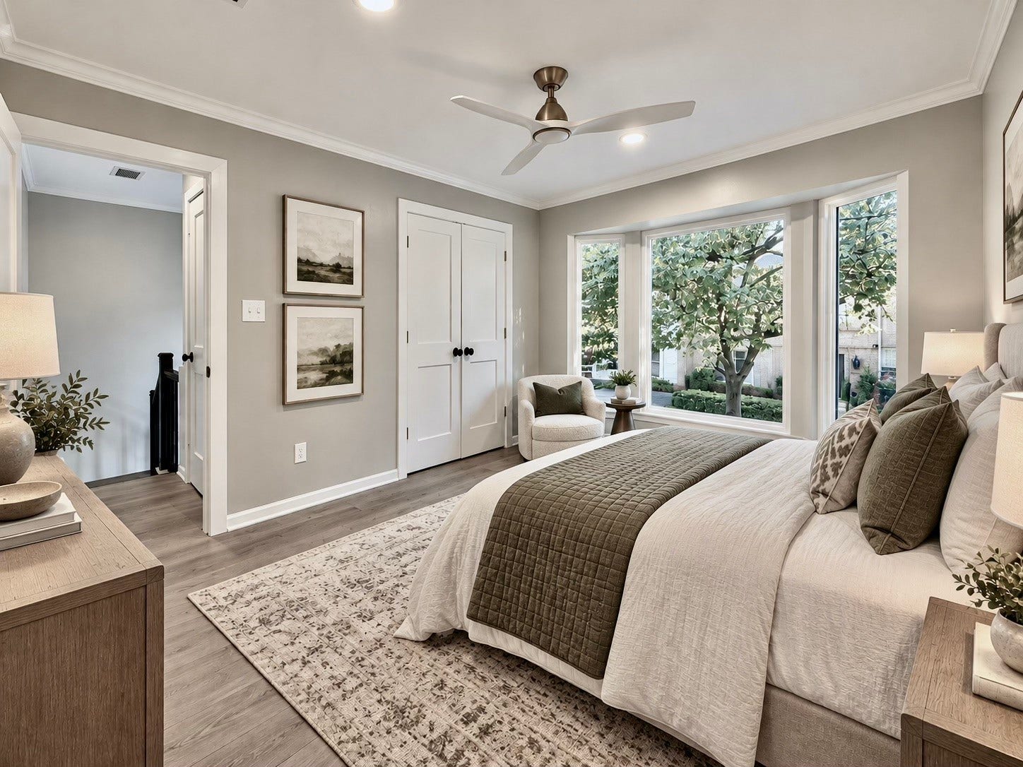 *Virtually Staged* guest bedroom with bay window overlooking the trees and the front of the townhouse.