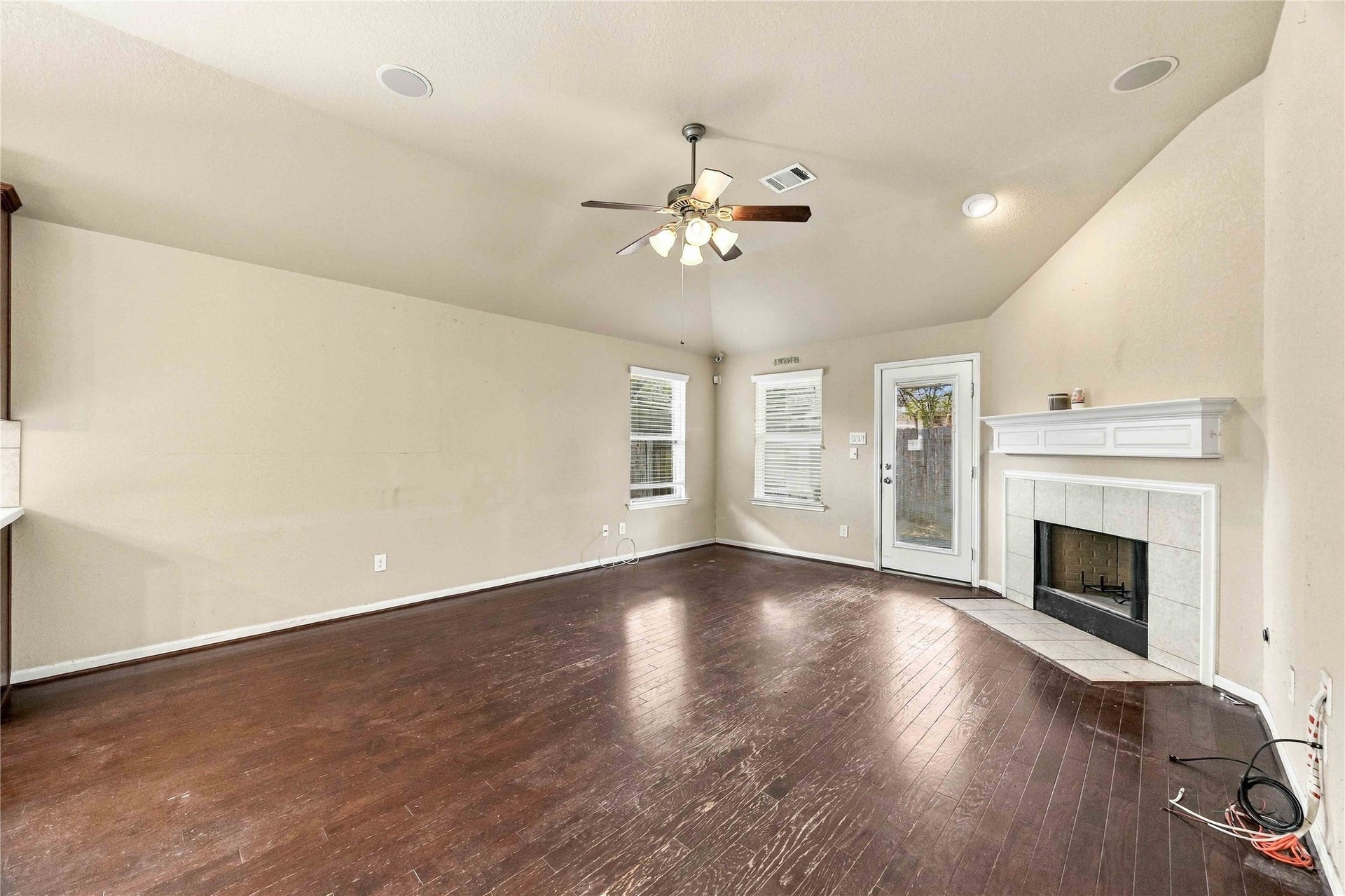 Fireplace creates a cozy focal point in the main living area.