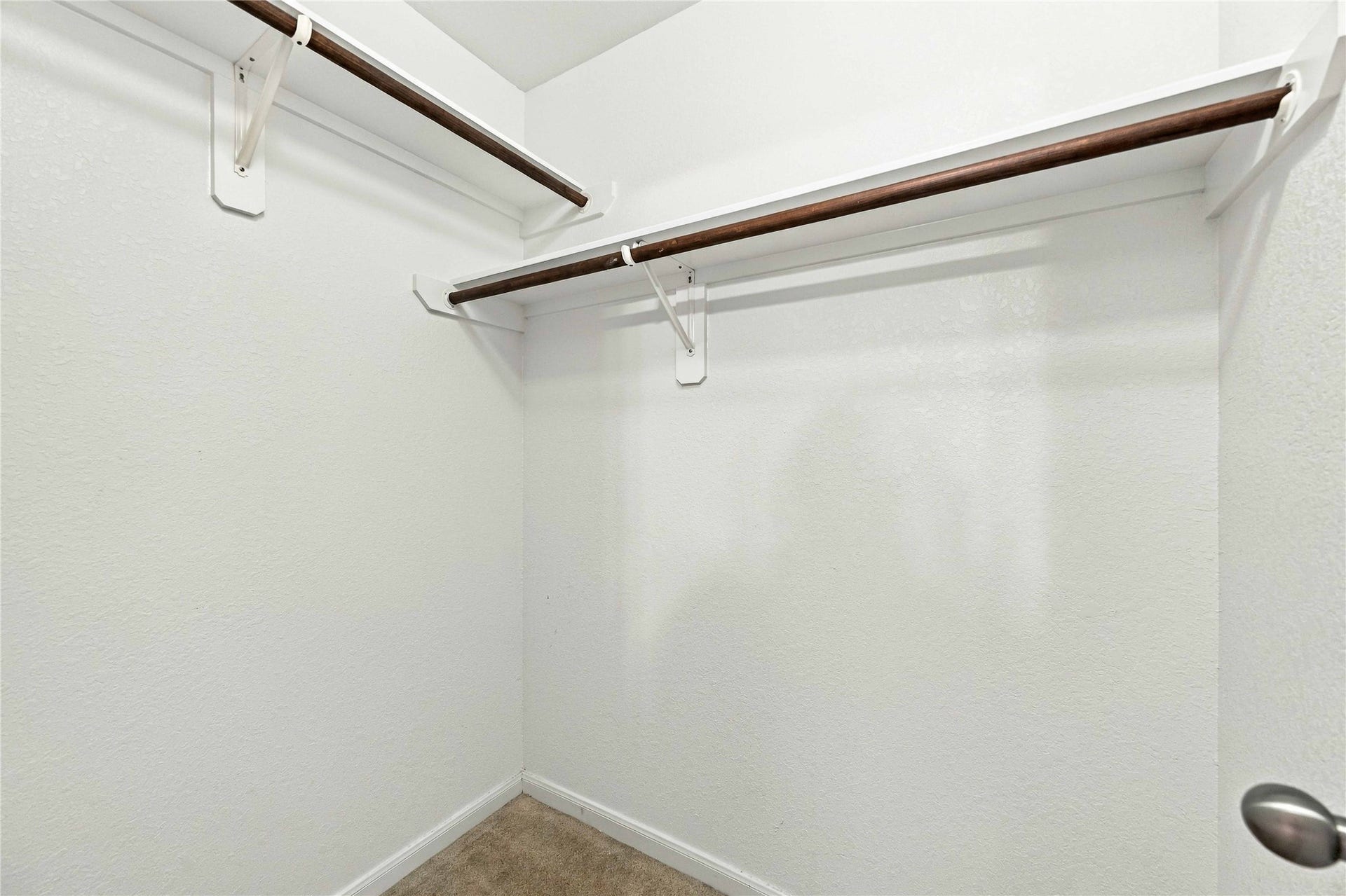 Generously sized bedroom closets provide plenty of storage space.