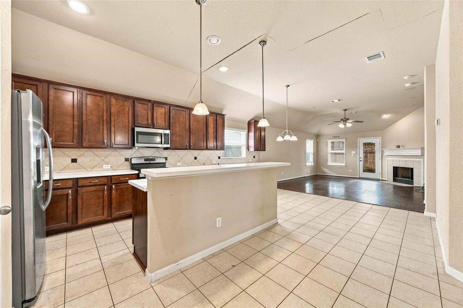 Spacious kitchen offers tons of storage and opens to the living area, perfect for entertaining.