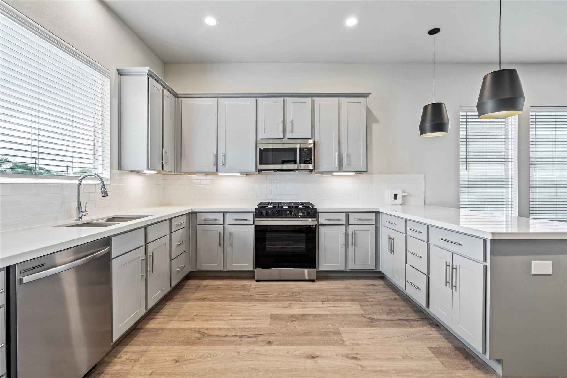 Representative photo showing the communitys model home kitchen. Layout and selections may vary.