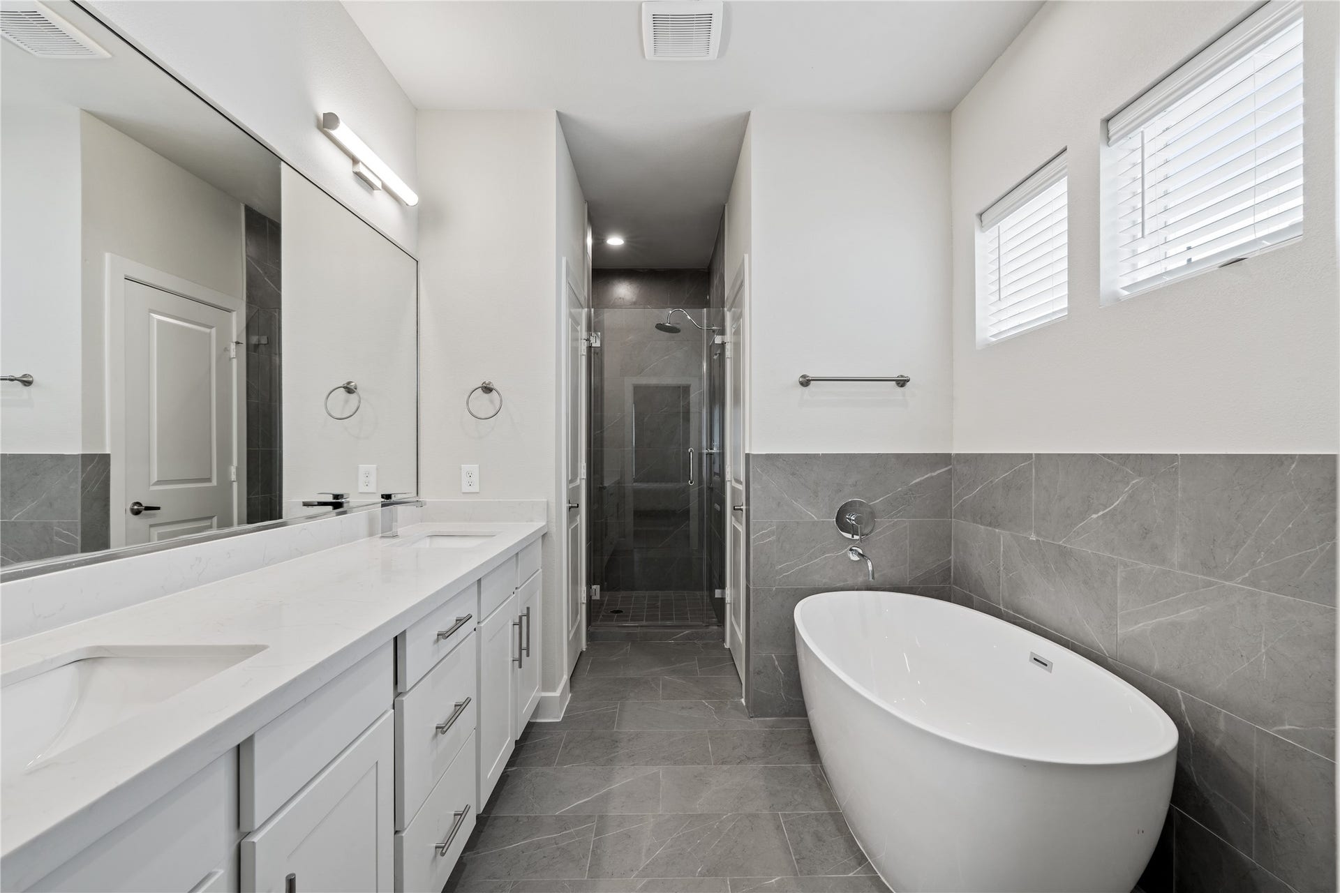 Representative photo showing the communitys model home primary bathroom. Layout and selections may vary.