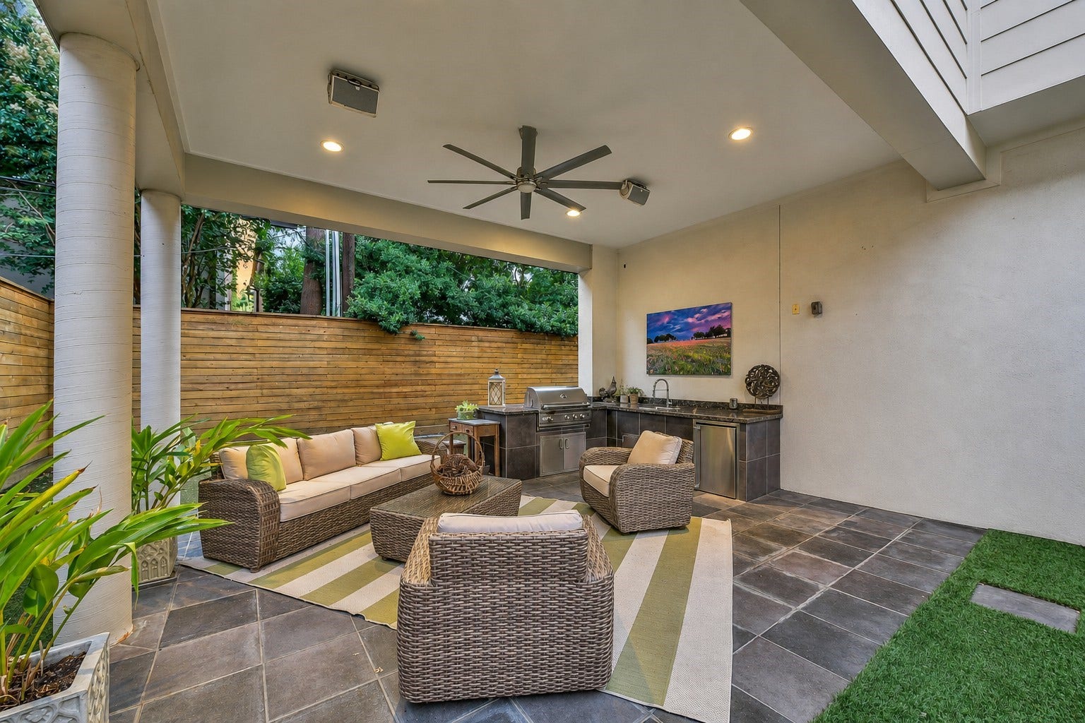 2302 Persa Street, Houston, TX 77019 Another view of the covered outdoor space perfect for entertaining, complete with outdoor kitchen.