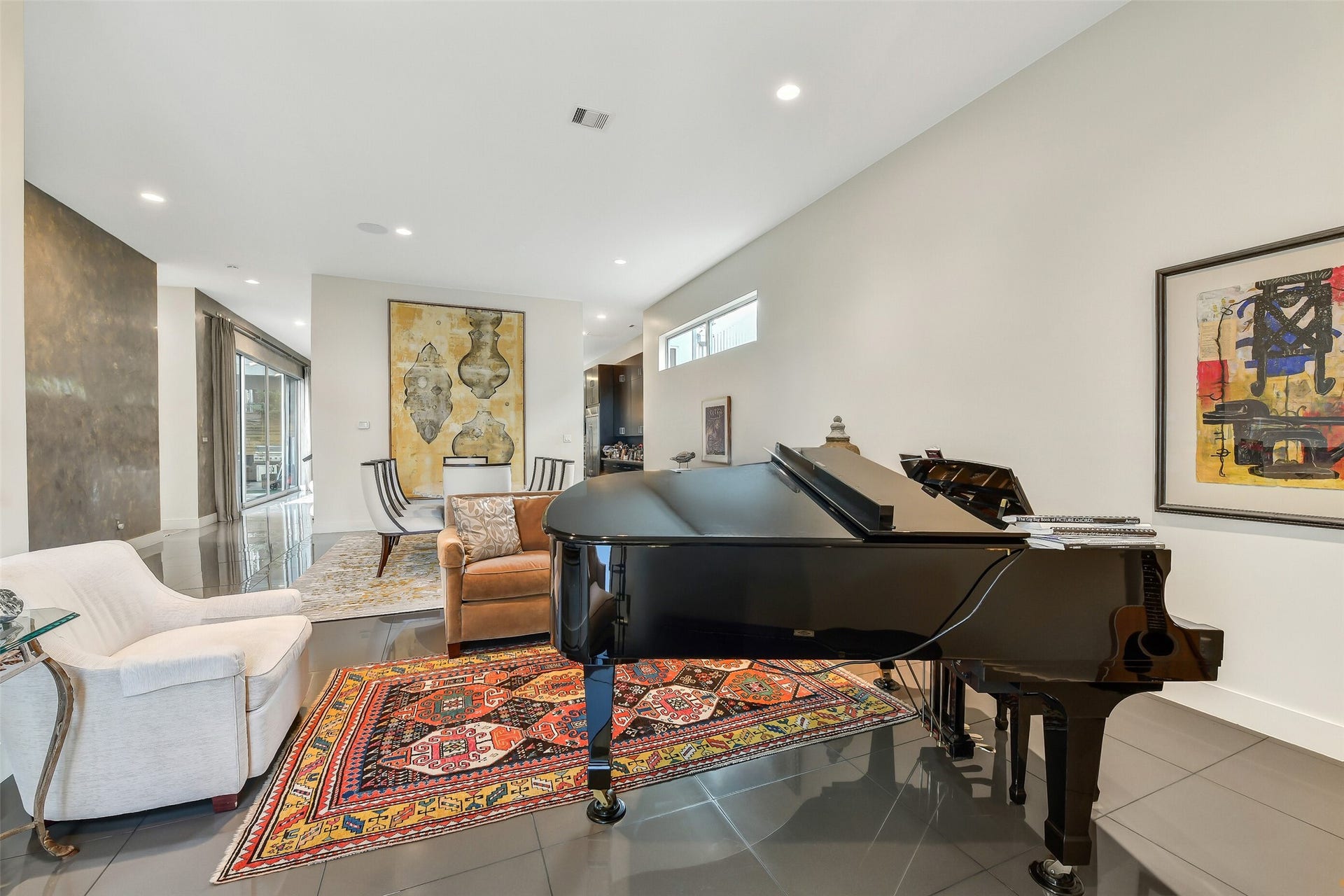 2302 Persa Street, Houston, TX 77019 Combining modern design elements with classic luxury, this spacious formal living area is perfect for relaxing or effortless social gatherings.
