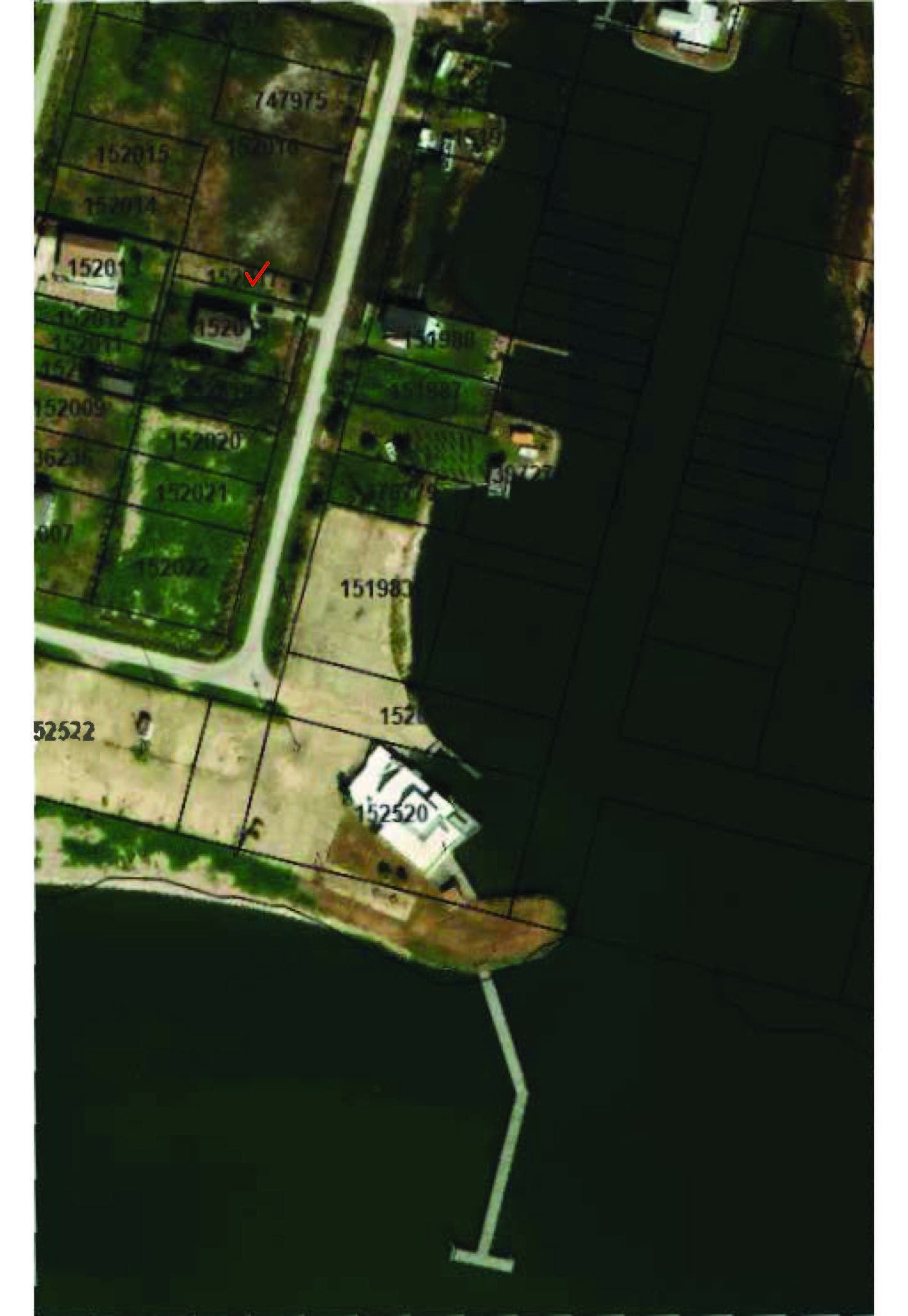 1022 19th Street, San Leon, TX 77539 The aerial photo shows a waterfront view with multiple plots. A road runs alongside the subject lot and is an ideal location for water enthusiasts.