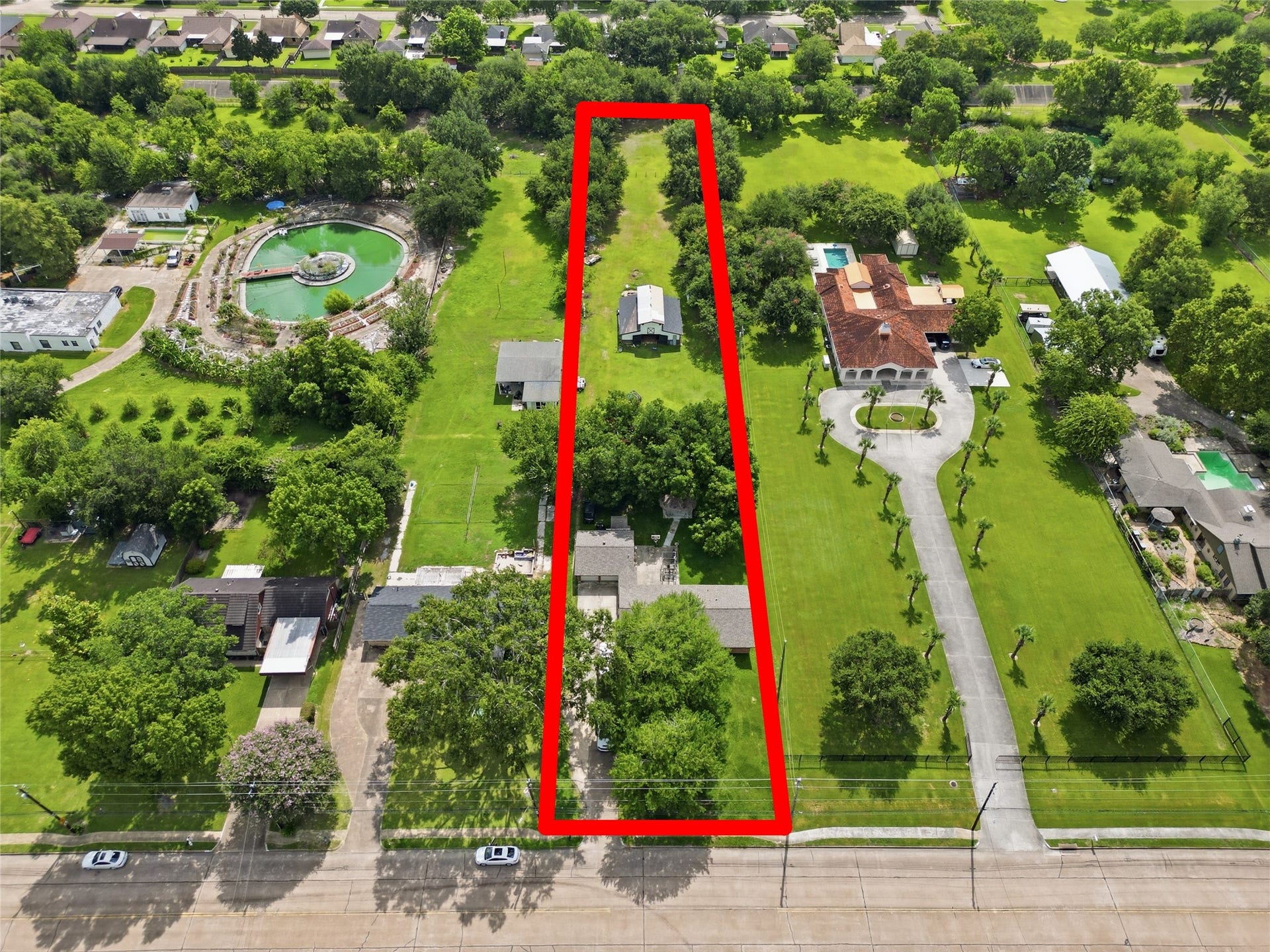 3305 Luella Avenue, Deer Park, TX 77536 This aerial view highlights the property's exceptional size, privacy, and versatility, delivering a true country-living feel.