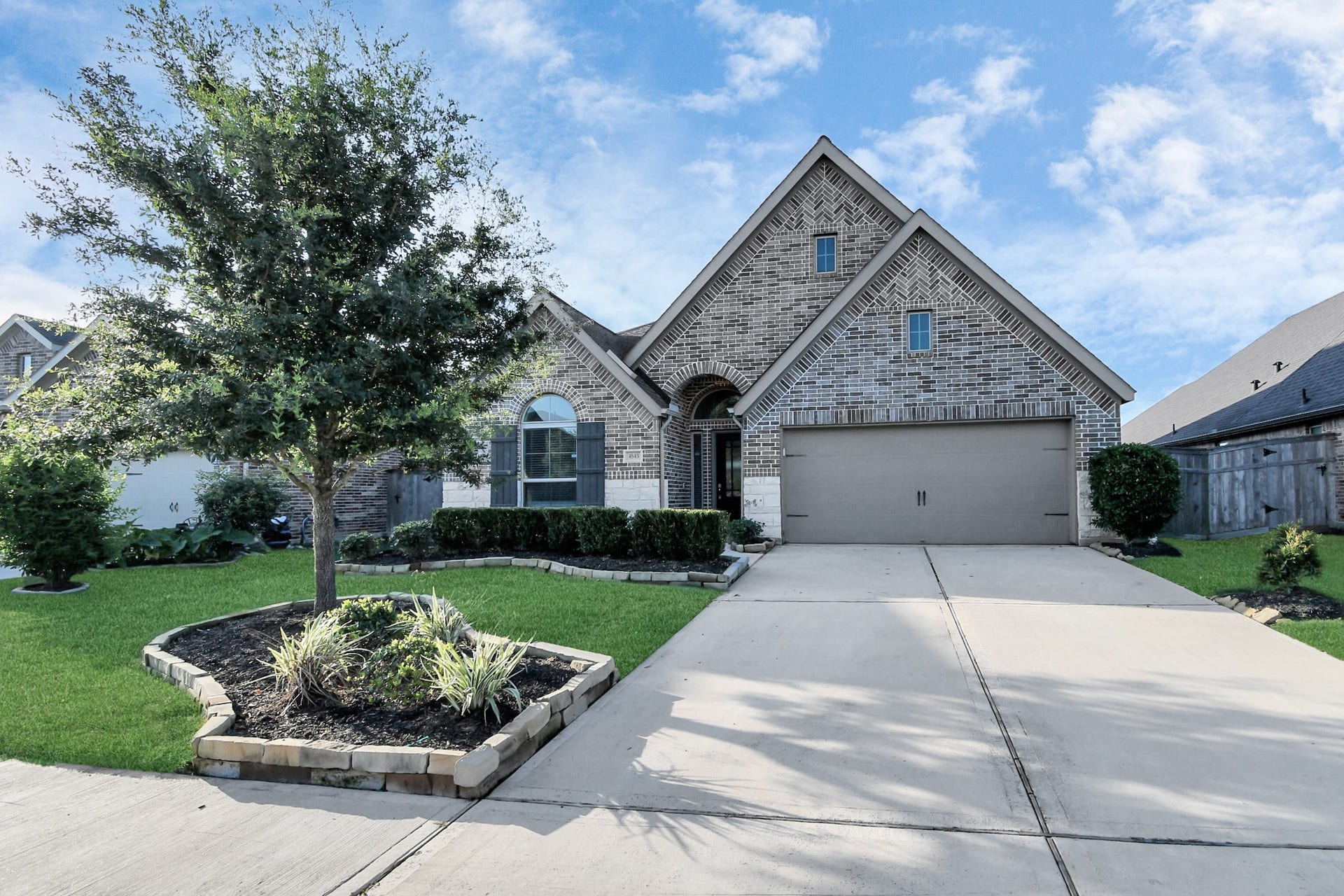 4543 Jennings Creek Court, Fulshear, TX 77441 1 story house with beautiful curb appeal!
