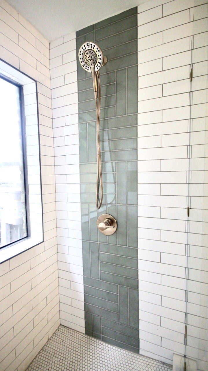7827 Zilonis Court, Jersey Village, TX 77040 Luxurious master shower featuring sleek glass and elegant tilework for a spa-like experience.